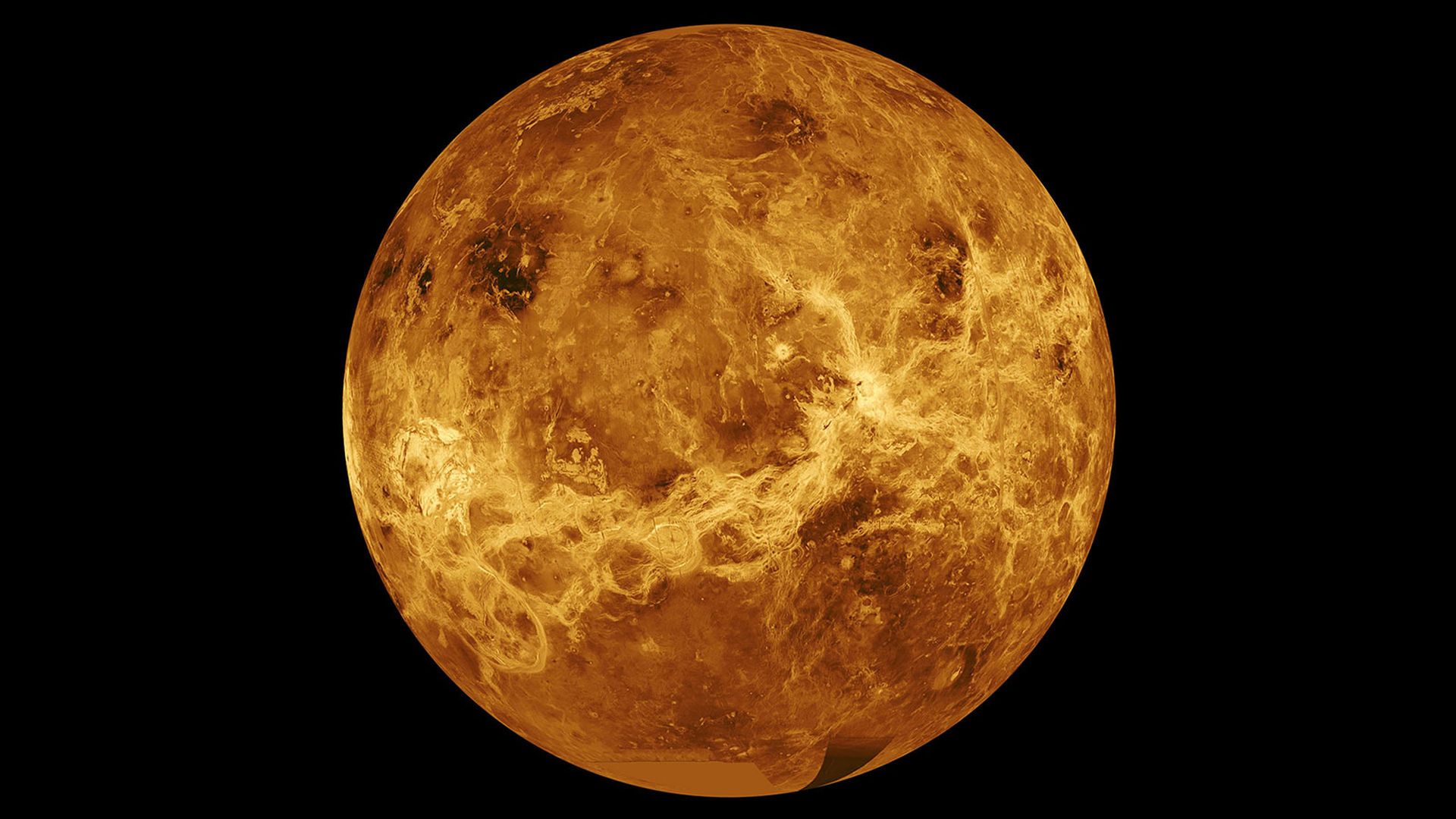 A view of the planet Venus shining in yellow light