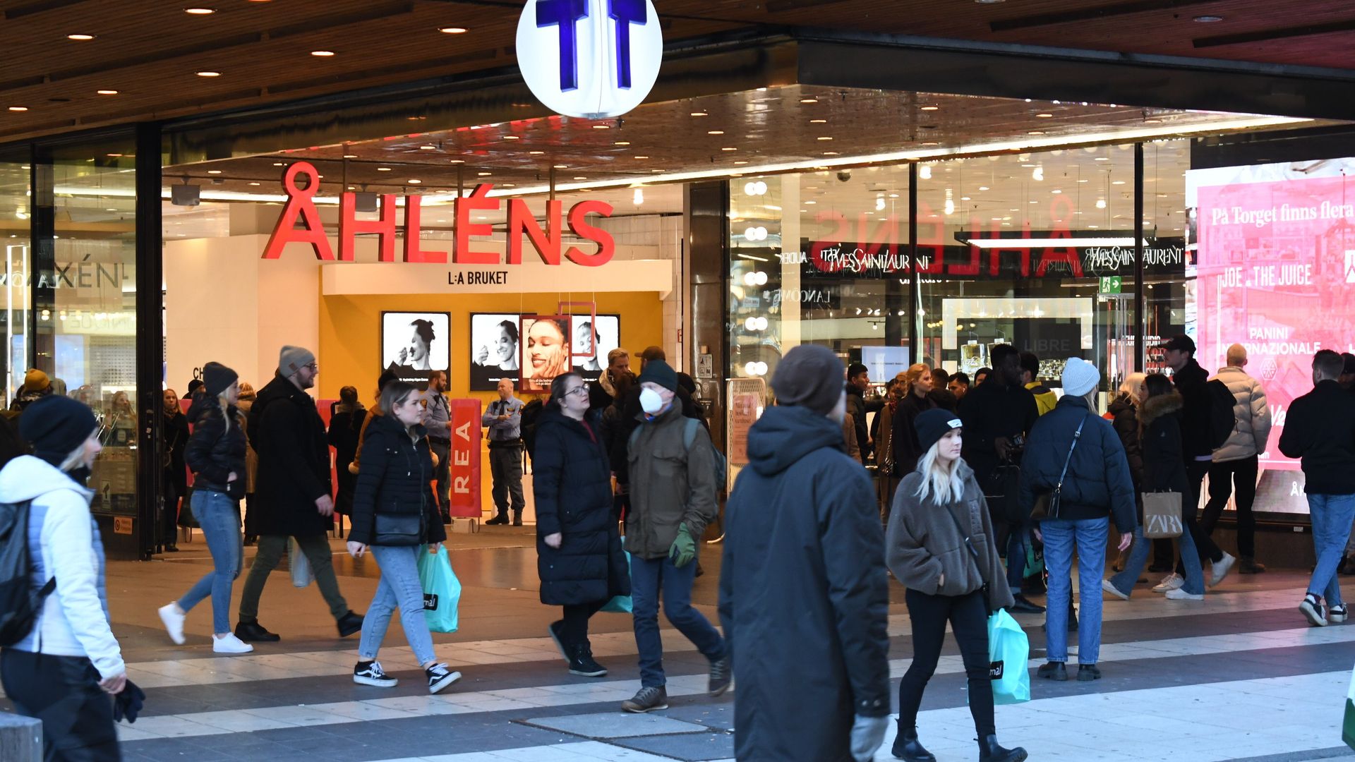 People walk in crowds in Stockholm, Sweden on February 5, 2022