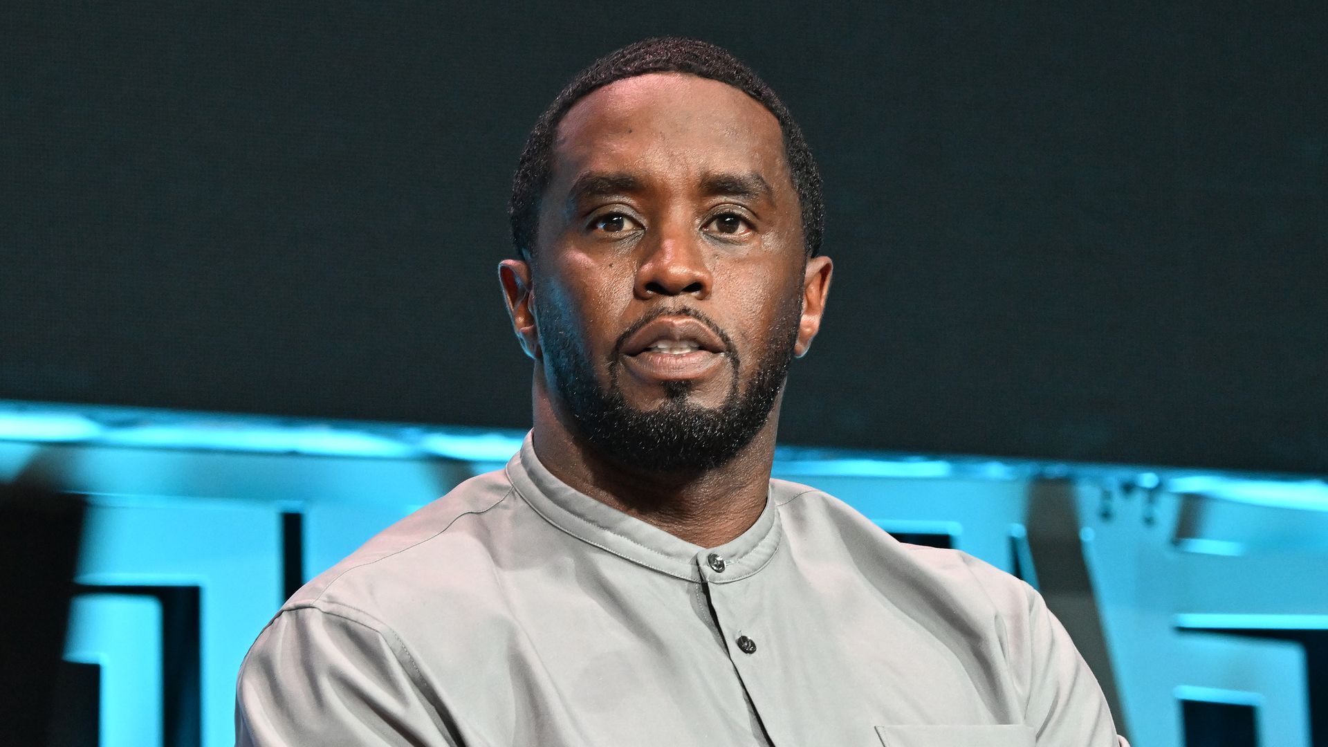 Sean Combs photographed wearing a gray shirt 