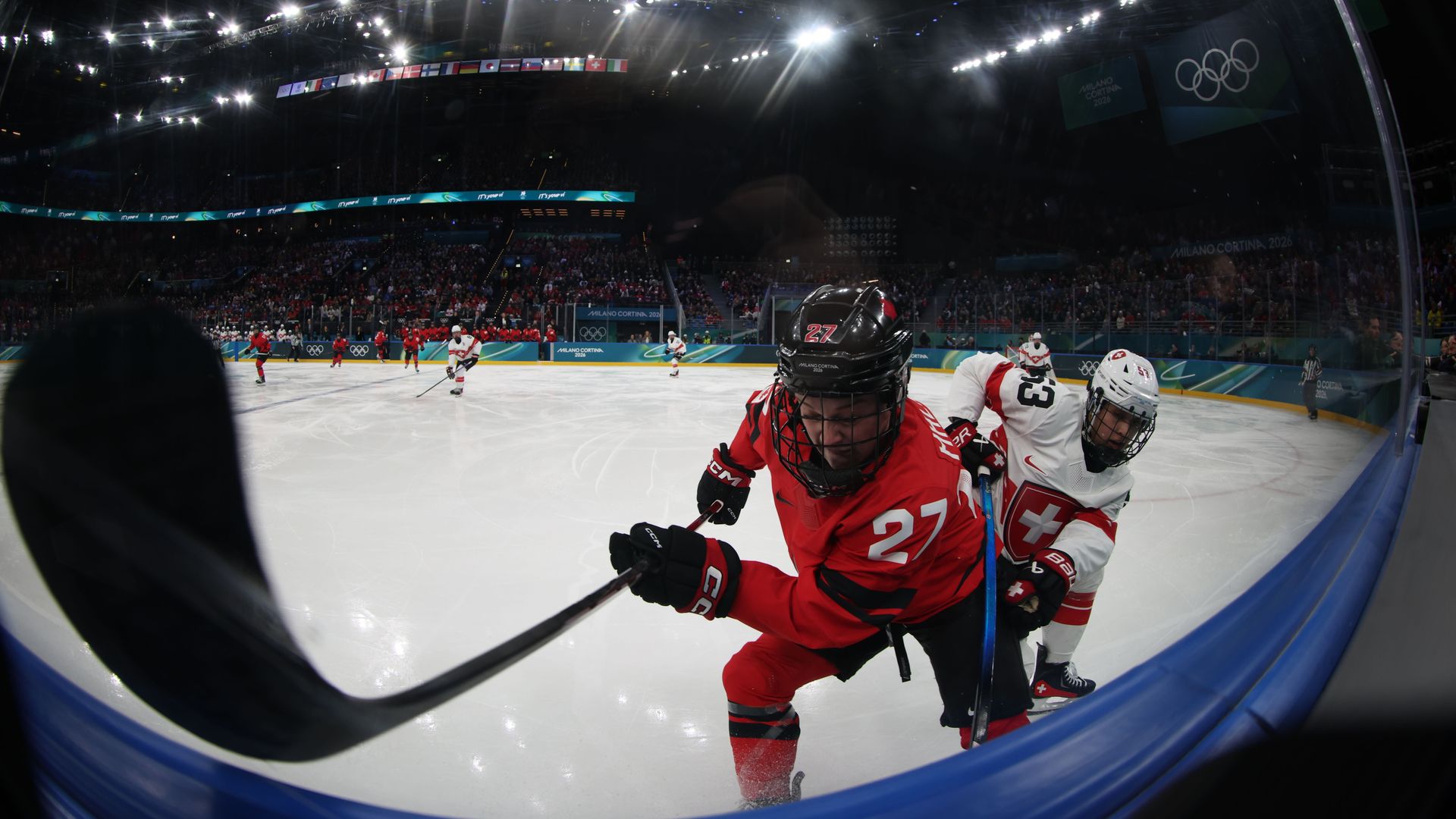 Emma Maltais of Team Canada skates away from a Swiss opponent during Monday's women's hockey semifinals.