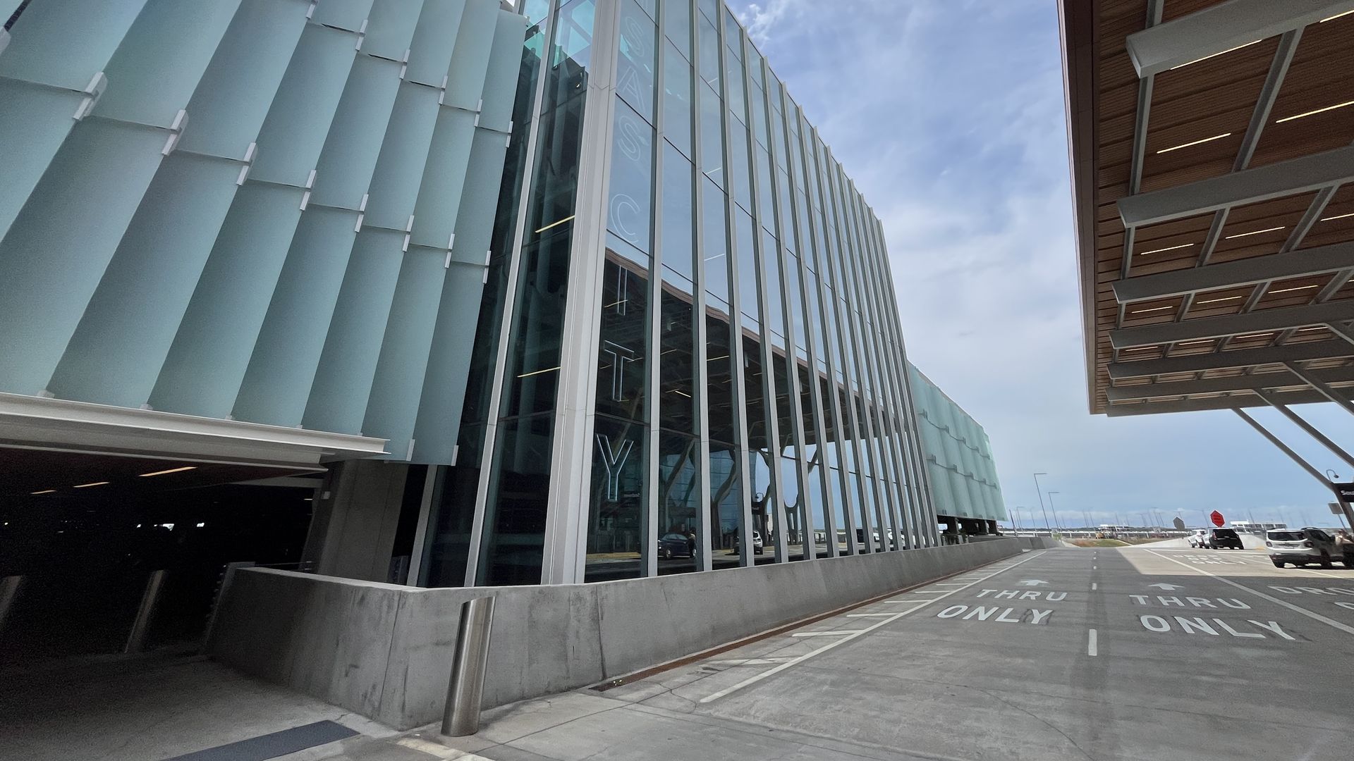 Photo shows the KCI parking garage next to the departures door.