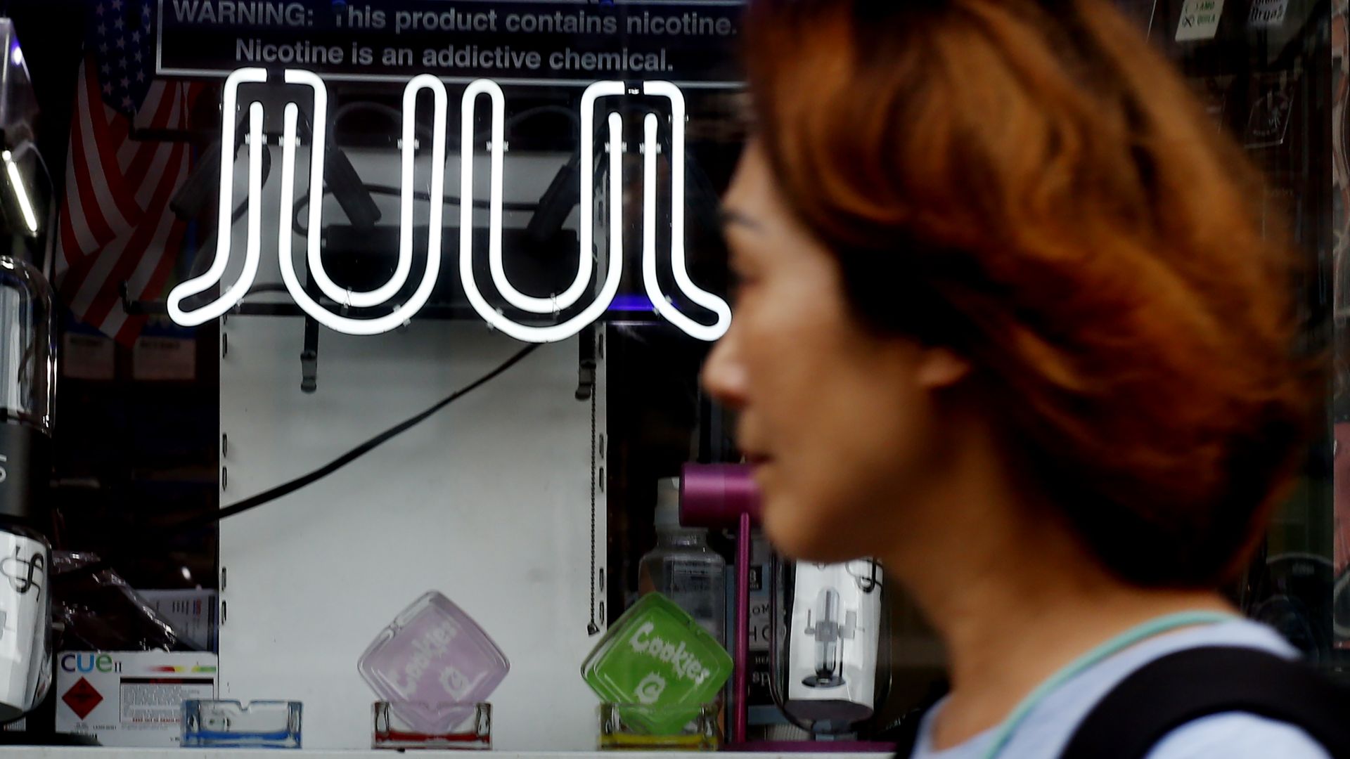 A person walking past a Juul store in New York City in June 2022.