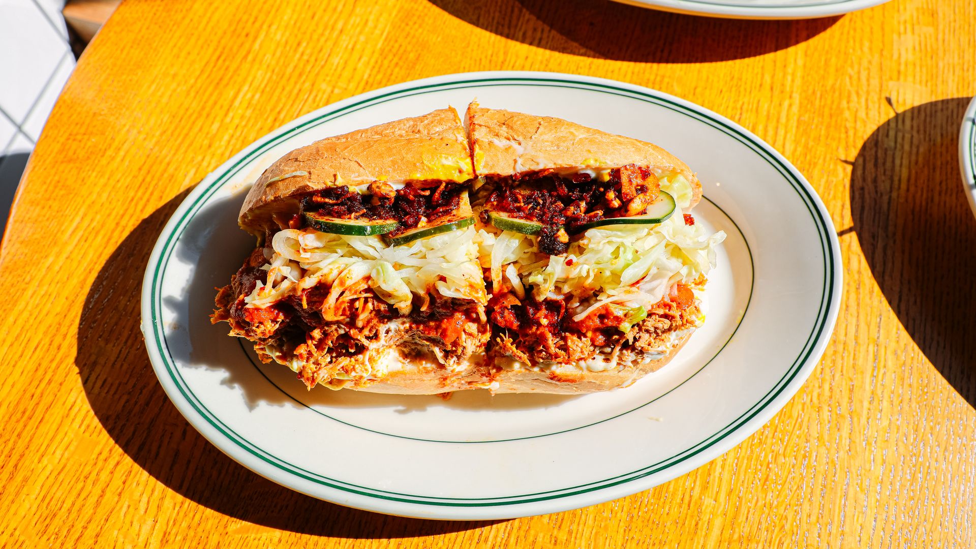 A sandwich on a wooden table