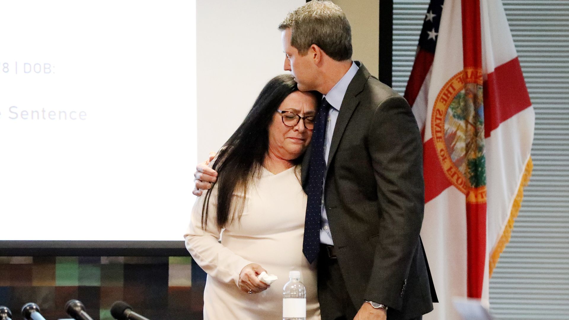 Andrew warren comforts Linda Sheffield