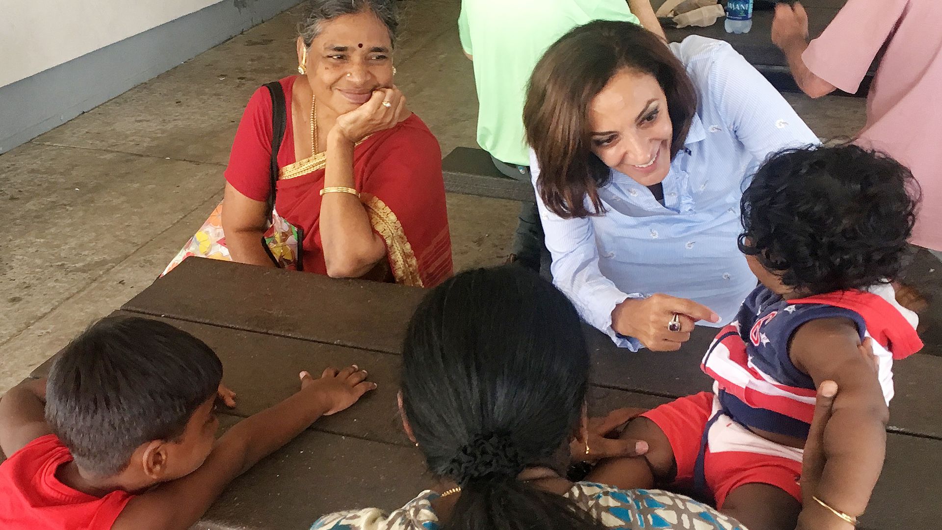 Katie Arrington chats with children and a mother in South Carolina