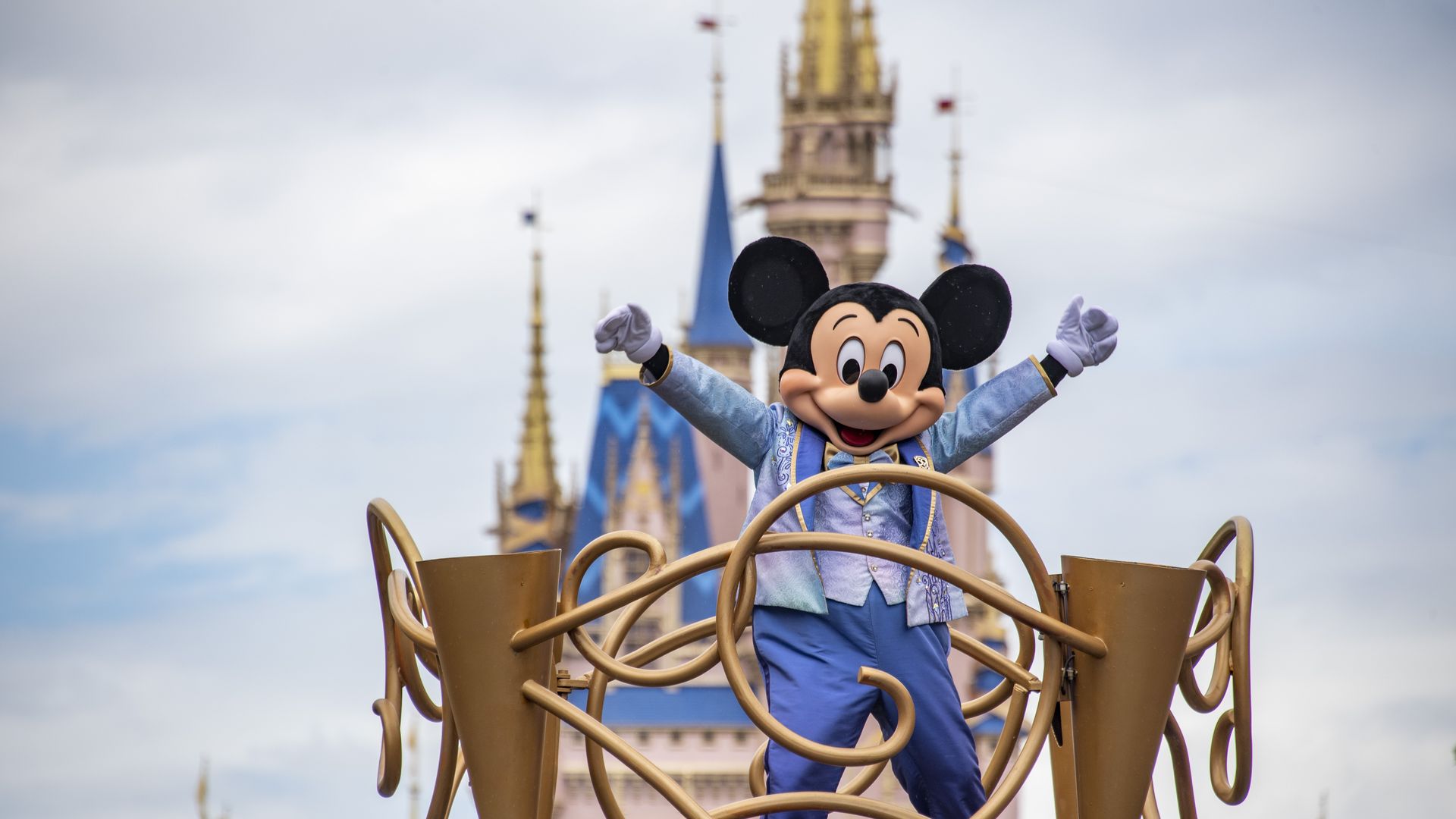 Mickey Mouse and friends take part in a cavalcade parade on Main Street USA at the Magic Kingdom Park at Walt Disney World in Orange County, Florida on June 1, 2022.