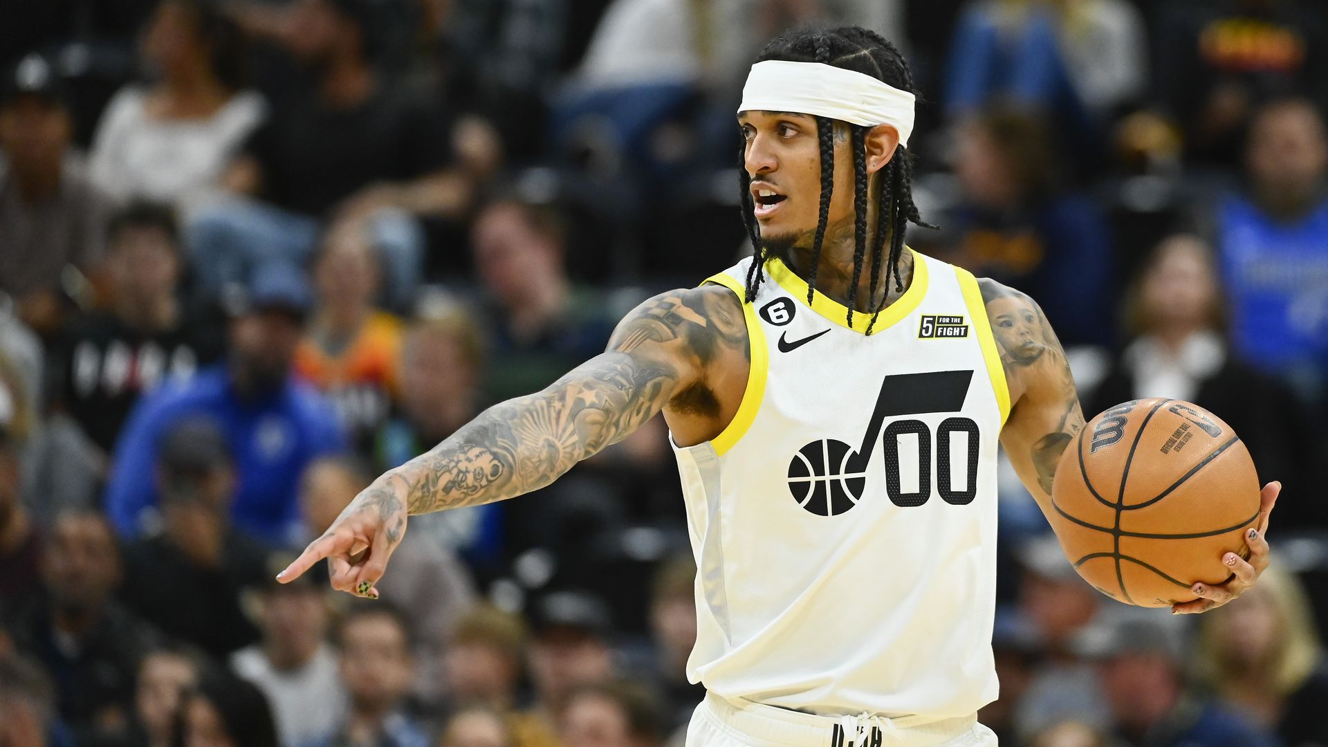 Jordan Clarkson, of the Utah Jazz, holds a basketball during a game.