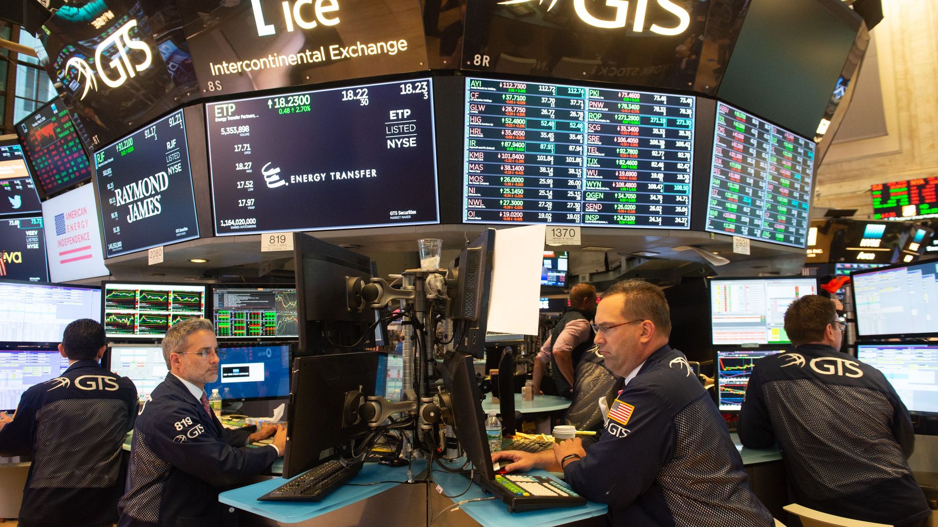 Traders work on the floor of the New York Stock Exchange.
