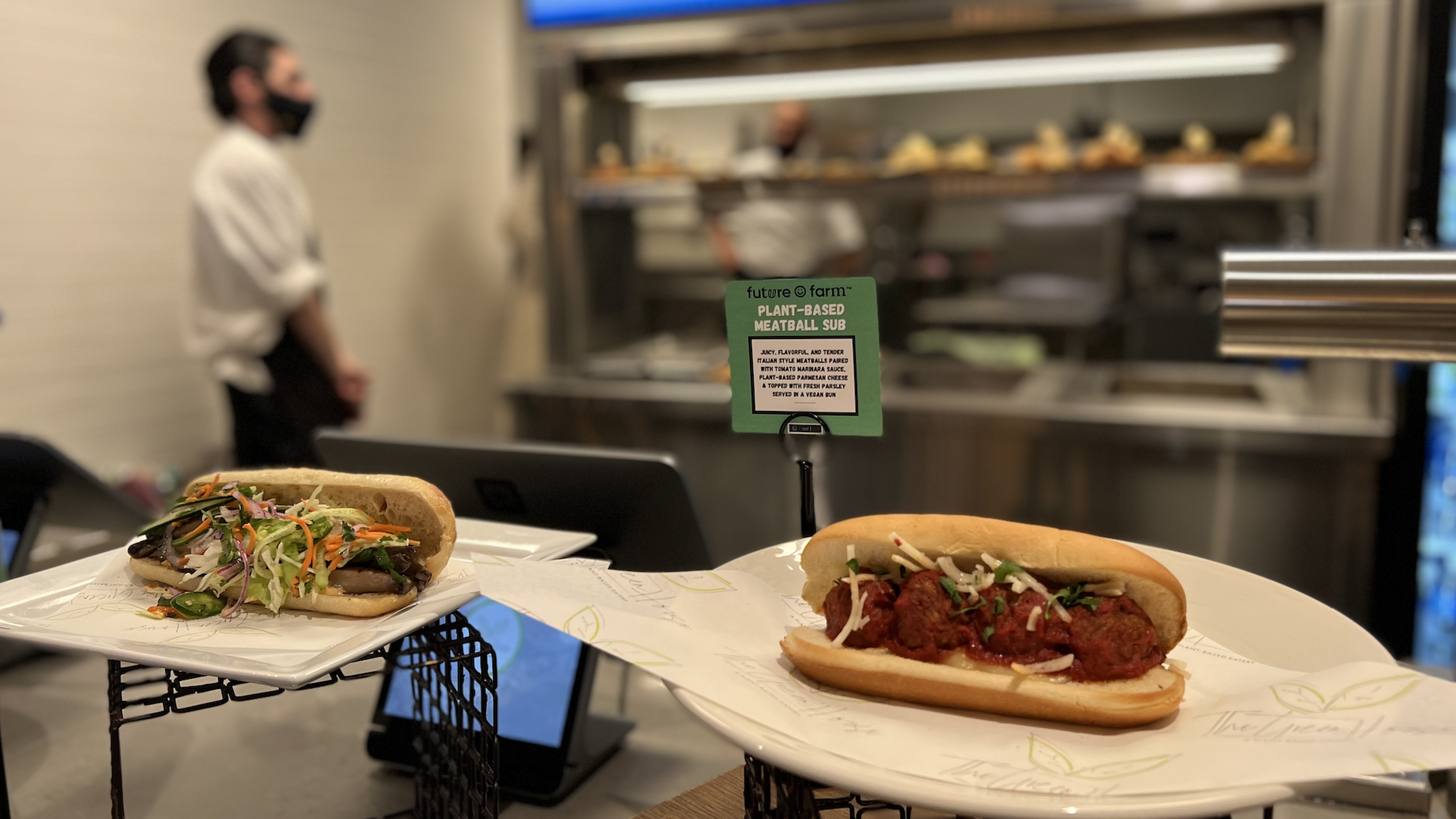 Vegetarian meatball subs and burgers are among the plant-based options at The Green House, a new eatery at San Francisco's Chase Center.