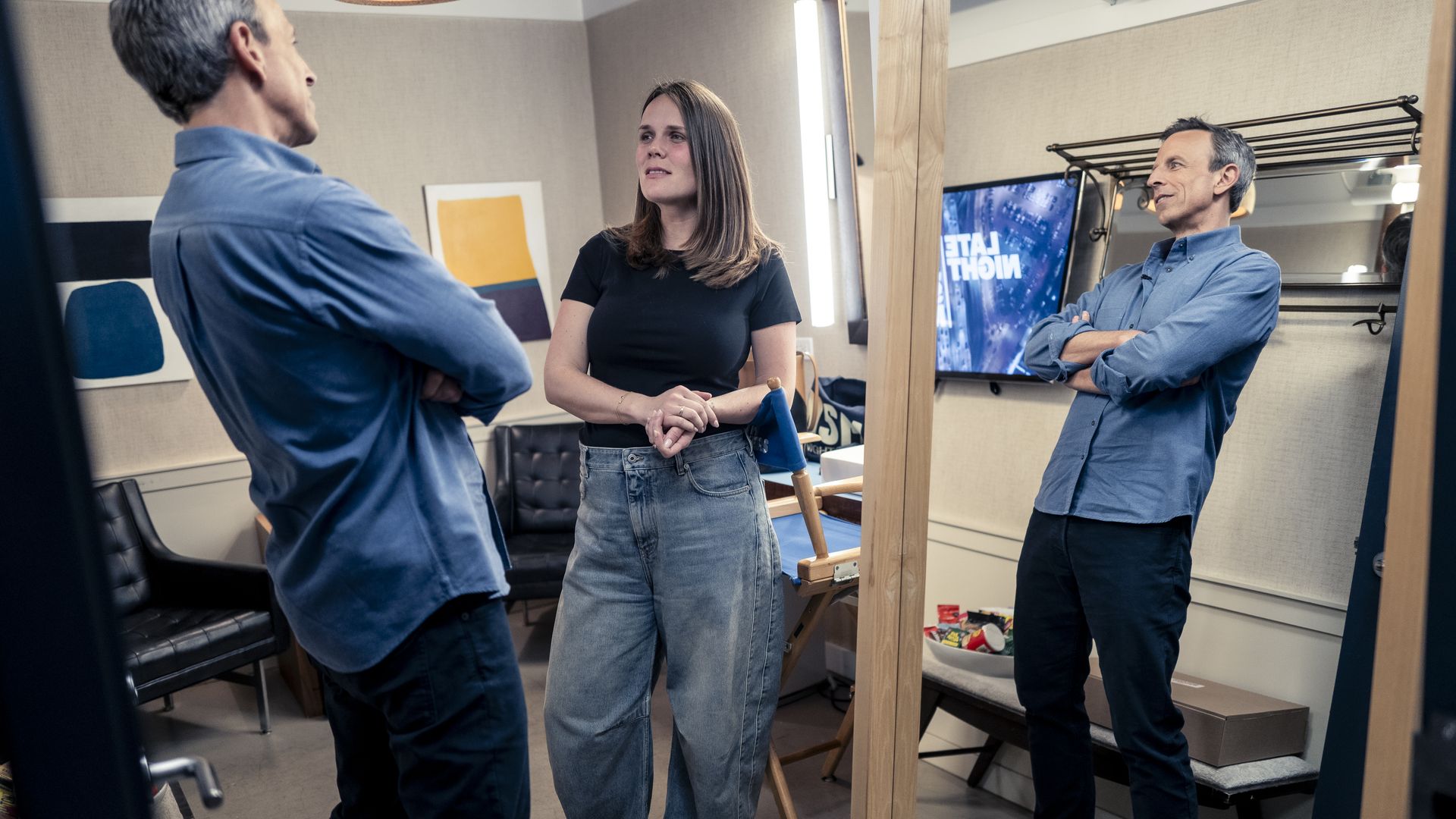 TV host Seth Meyers talks backstage with Caro Claire Burke, author of the runaway bestseller "Yesteryear." Photo: Lloyd Bishop/NBC via Getty Images