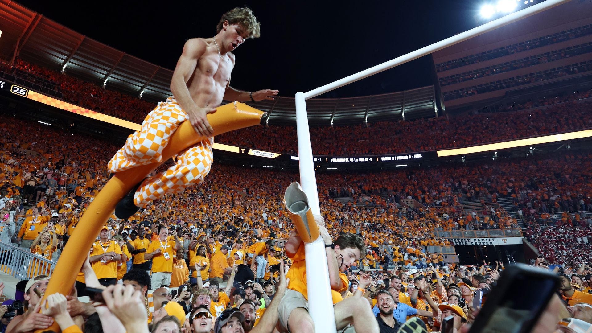 Tennessee Volunteers fans tearing down a goal post after their victor over the Alabama Crimson Tide at Neyland Stadium on Oct. 15.