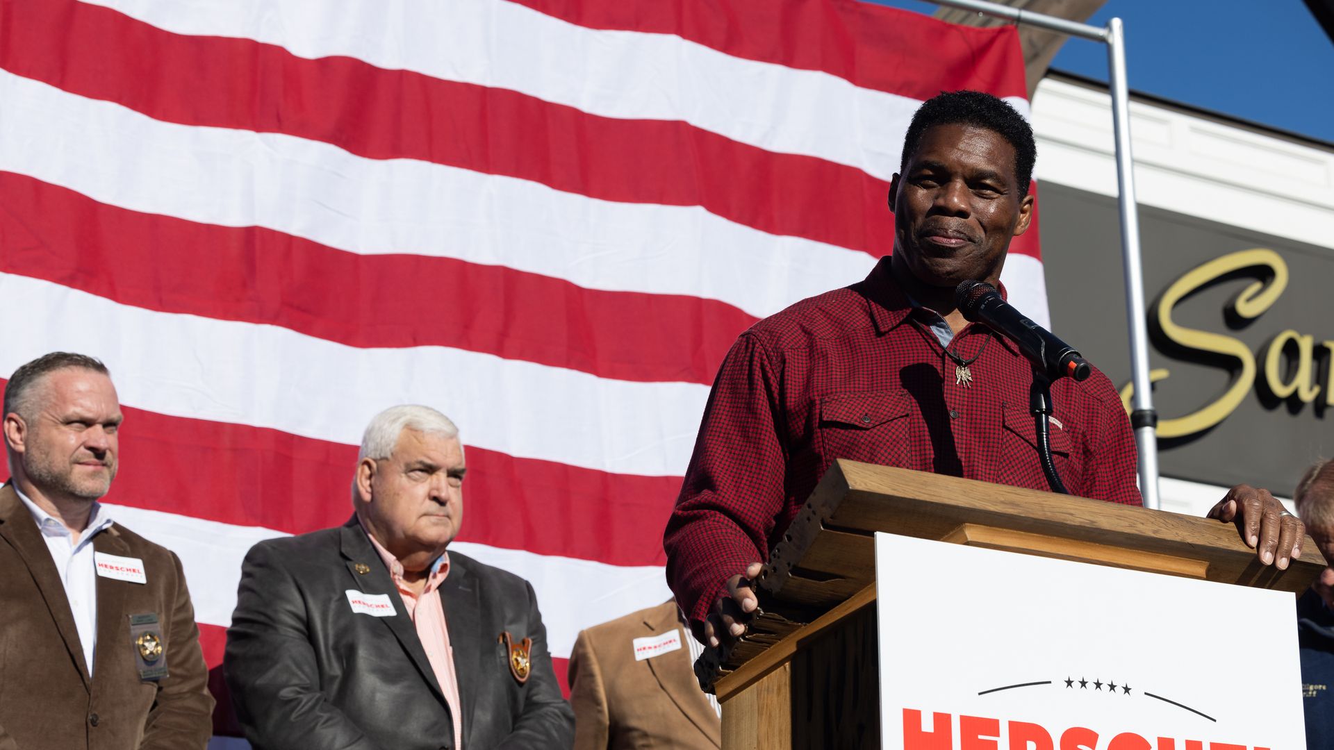 Georgia Republican Senate nominee Herschel Walker addresses the crowd of supporters during a campaign stop on October 20, 2022 in Macon, Georgia.