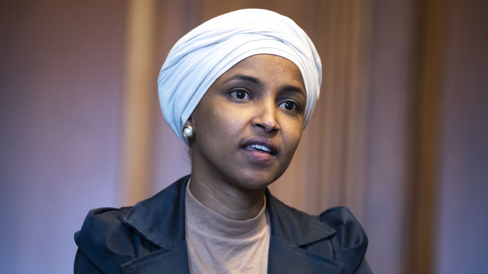 Rep. Ilhan Omar, D-Minn., is seen in the U.S. Capitols Rayburn Room during a group photo with the Congressional Black Caucus, on Wednesday, April 6.