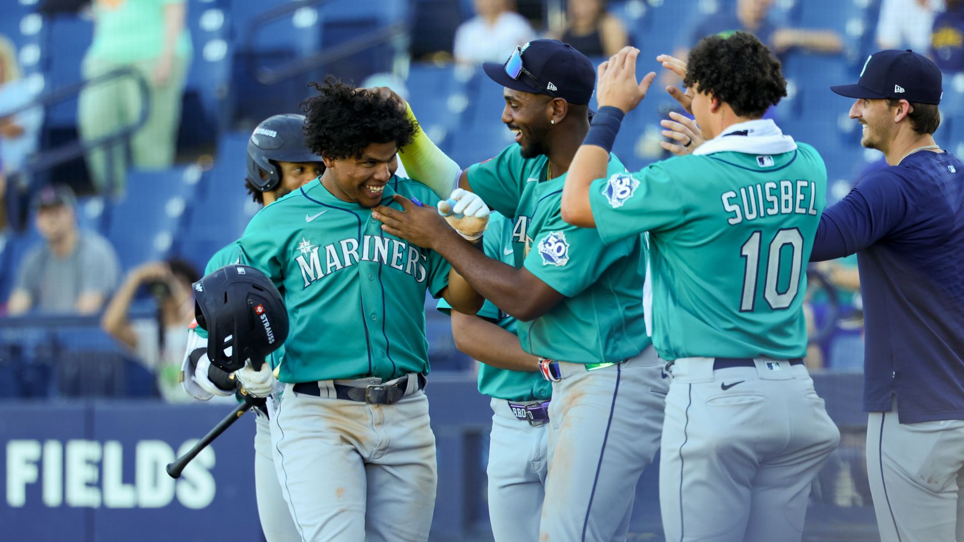 The Seattle Mariners celebrate after a home run. 