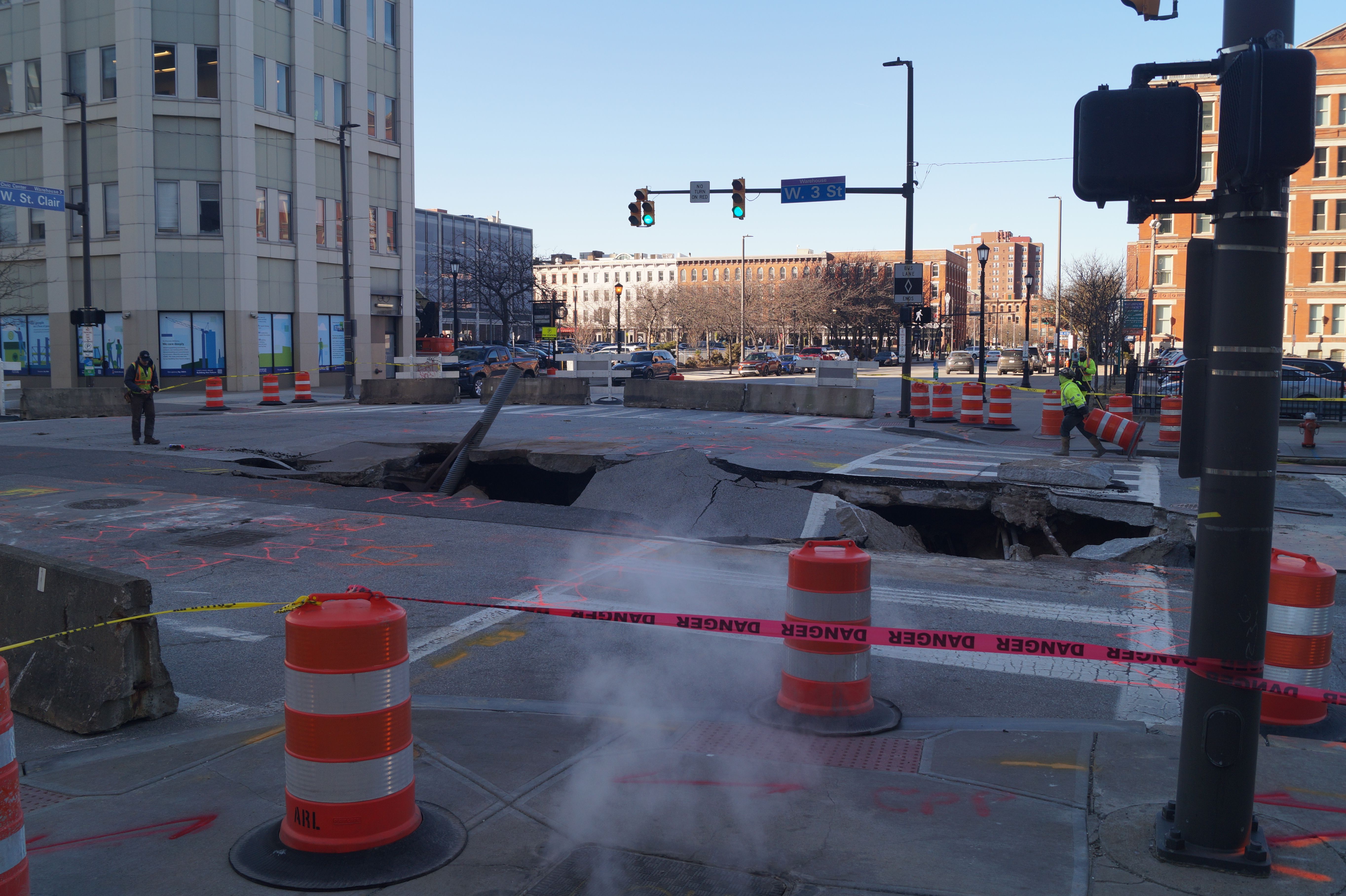 Sinkhole with traffic cones around it