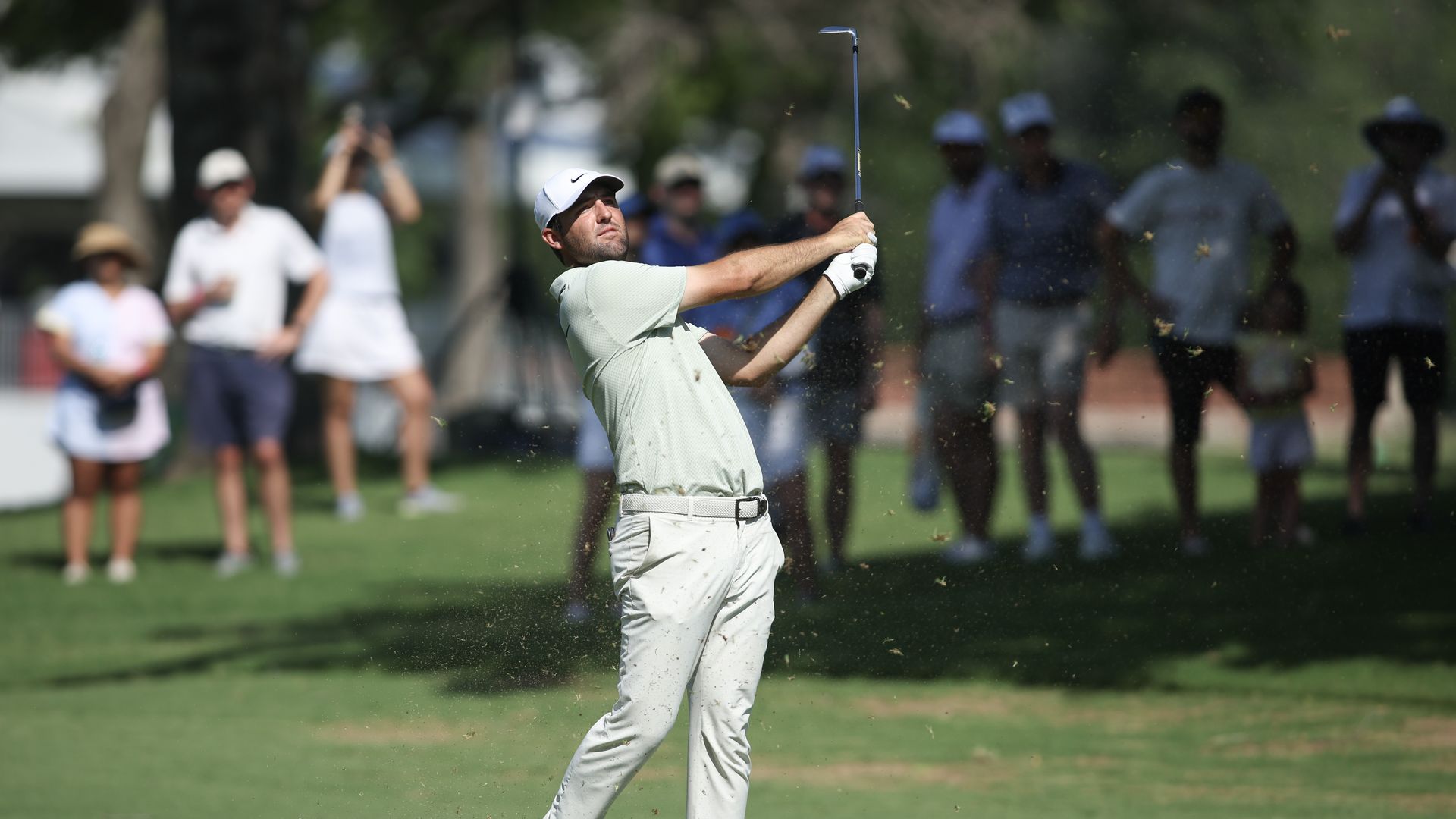 Scottie Scheffler of the United States hits from the 17th fairway during the final round of the Char