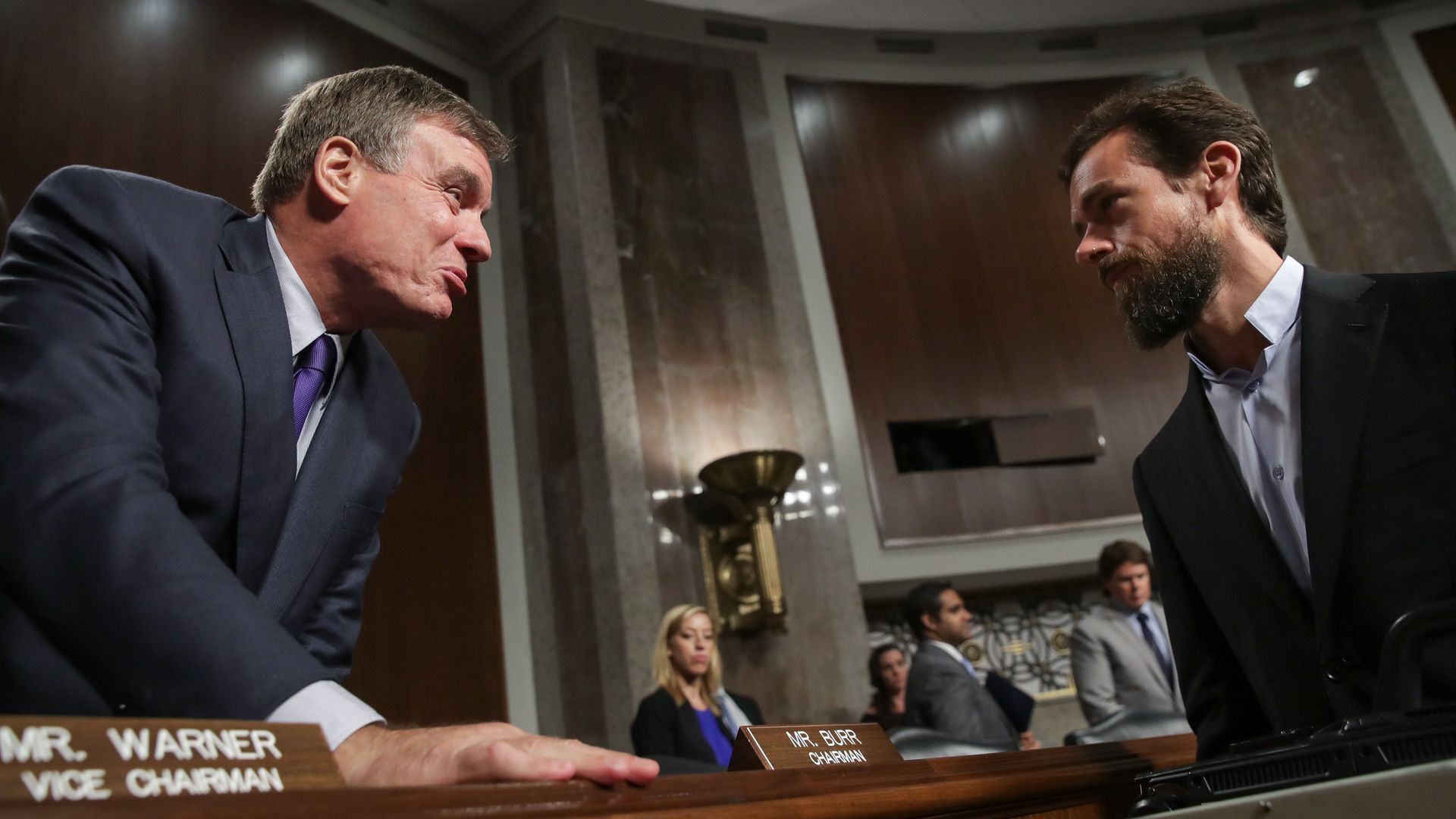 Sen. Mark Warner speaks with Twitter CEO Jack Dorsey.