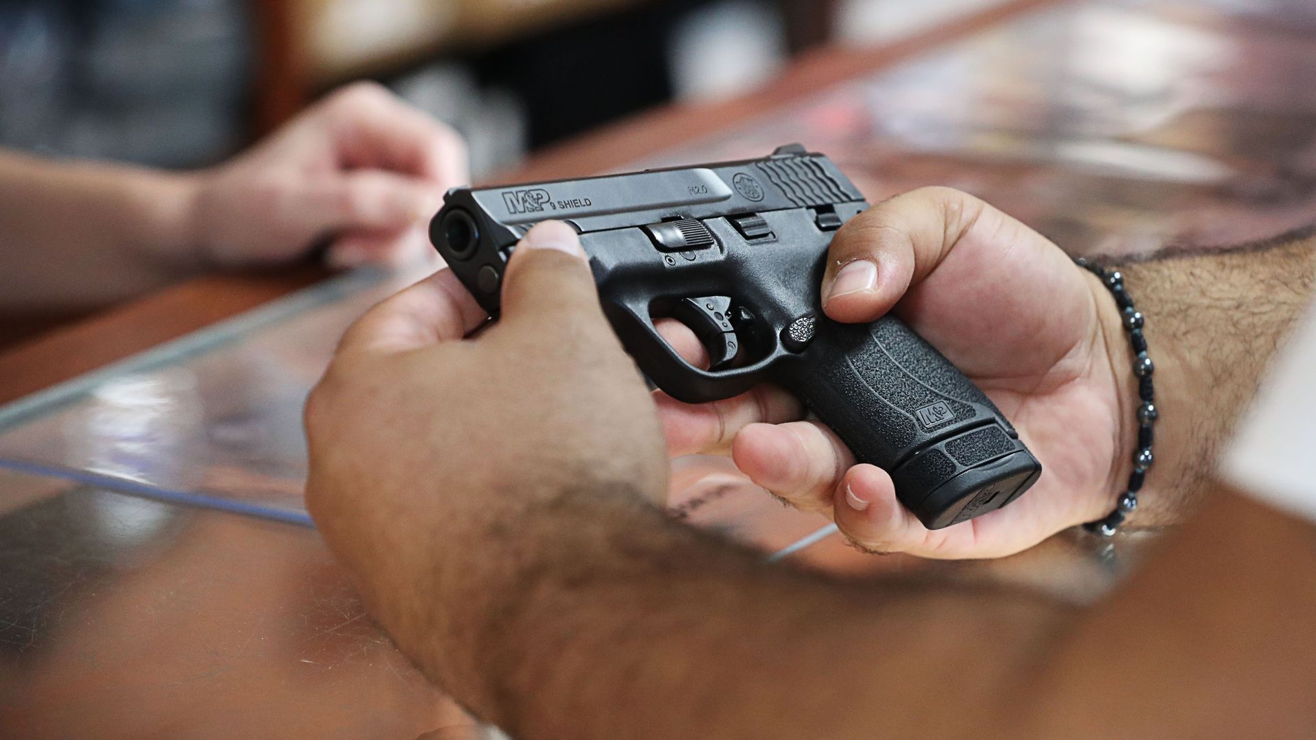 A person looking at a handgun in a store in Kissimmee, Florida, in December 2020.