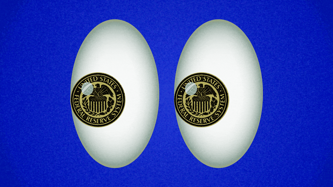 Animated illustration of a jittery eyes emoji, with Federal Reserve seals for pupils, shaking.