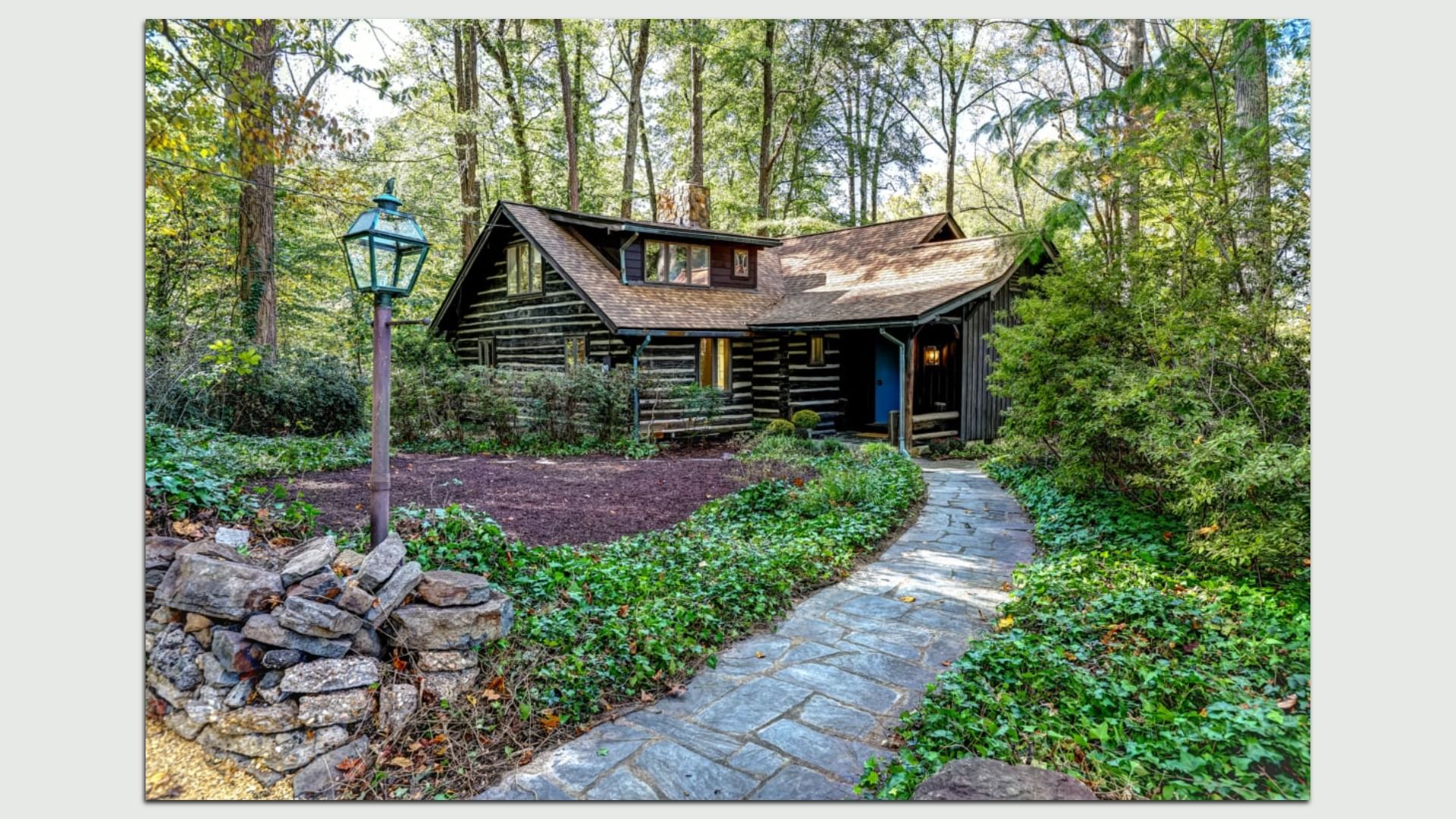 a log cabin in a peaceful woodsy setting 