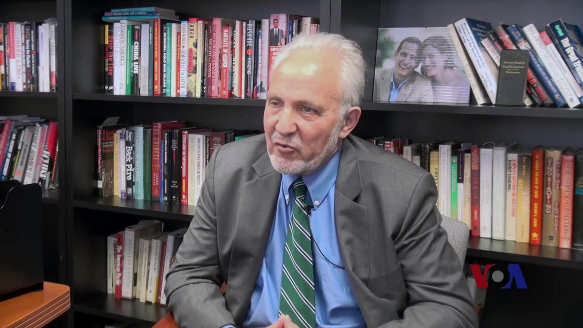 Photo of author James Mann in his office during interview with VOA