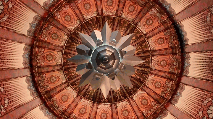 An image of an ornate 1920s domed theatre ceiling with an art deco chandelier at the center. The animated gif shows a spinning view from directly under the domed theatre ceiling.