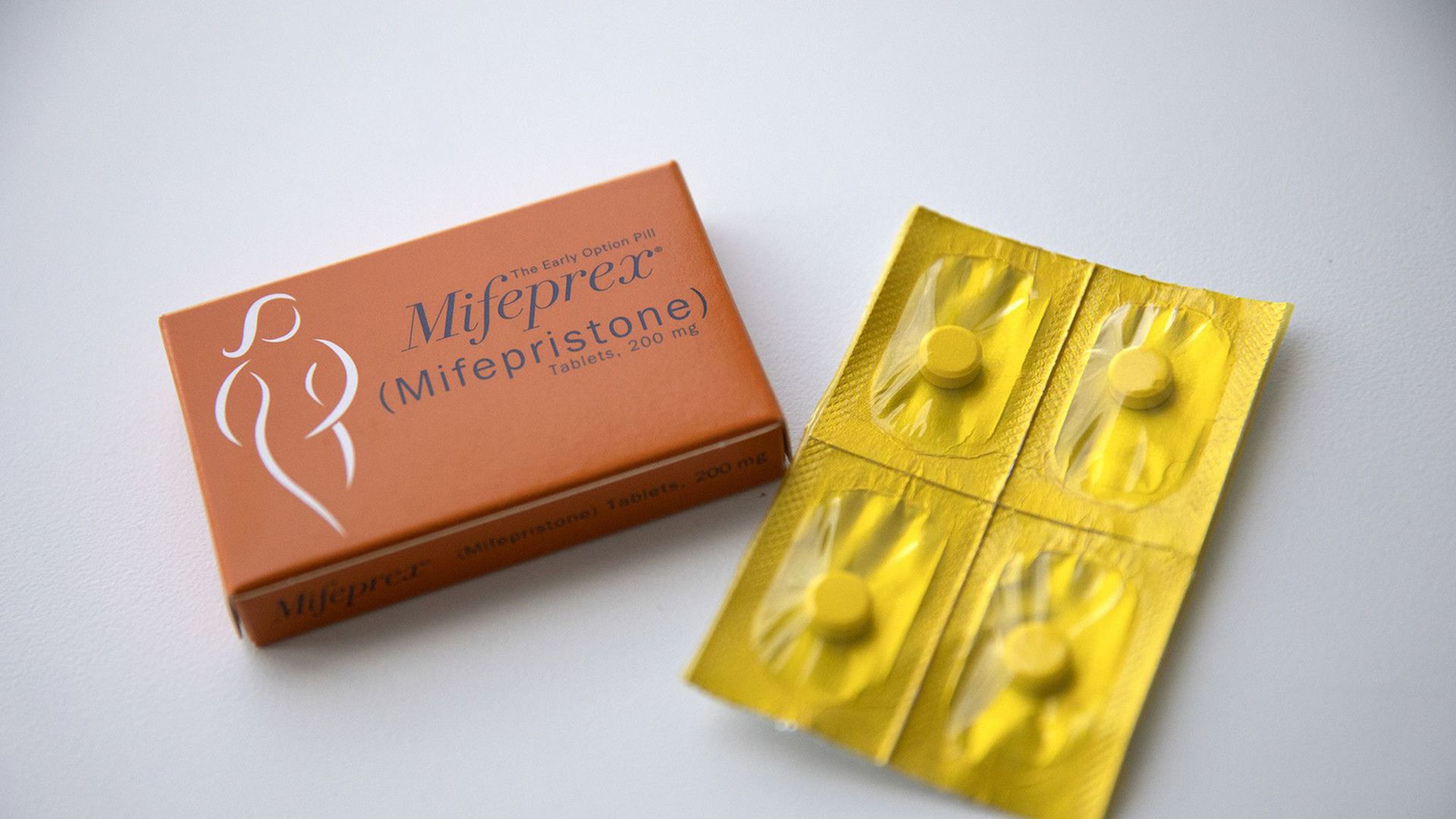 a box and packet of mifepristone