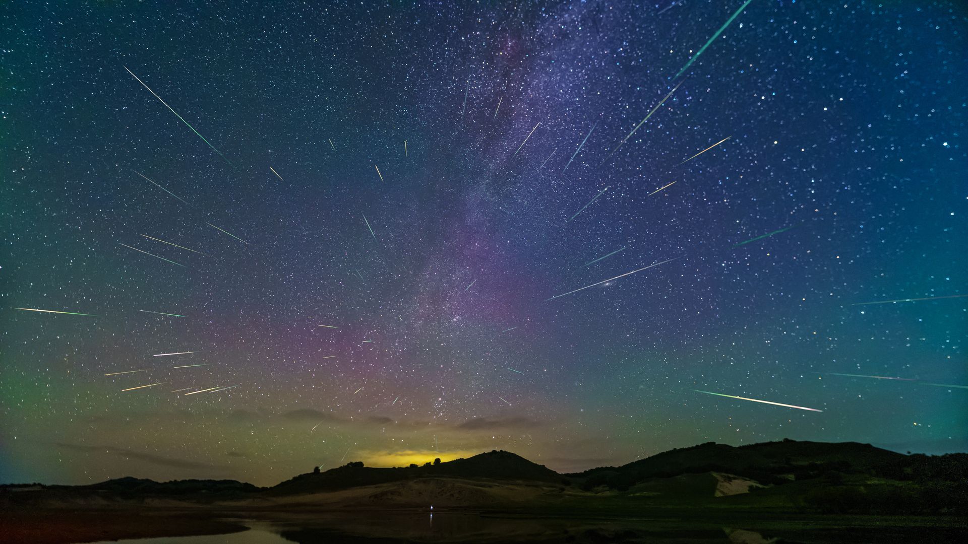 meteor showers over the night sky