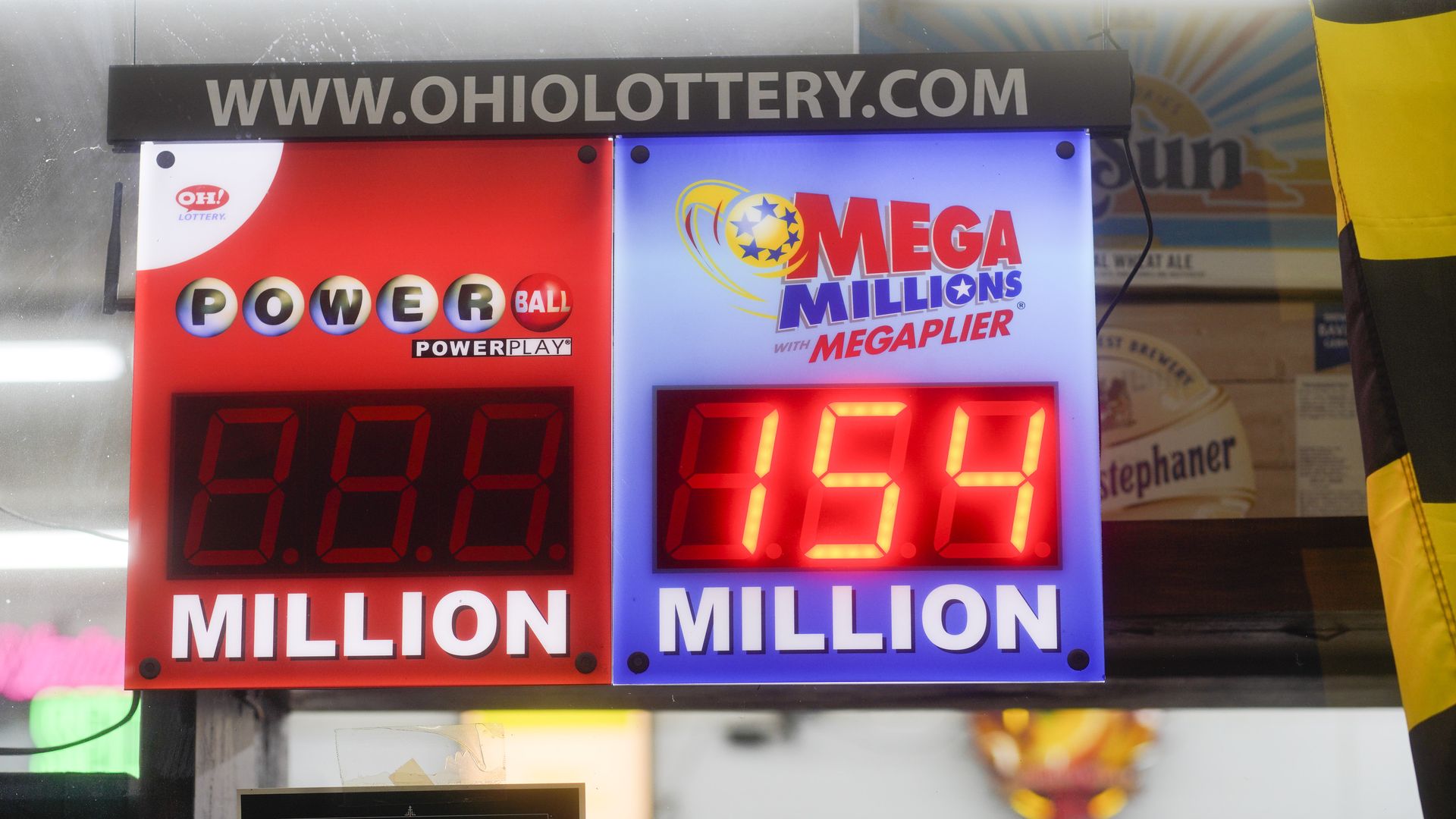 A neon sign advertising a $154 million payout for the Mega Millions Ohio lottery game. 