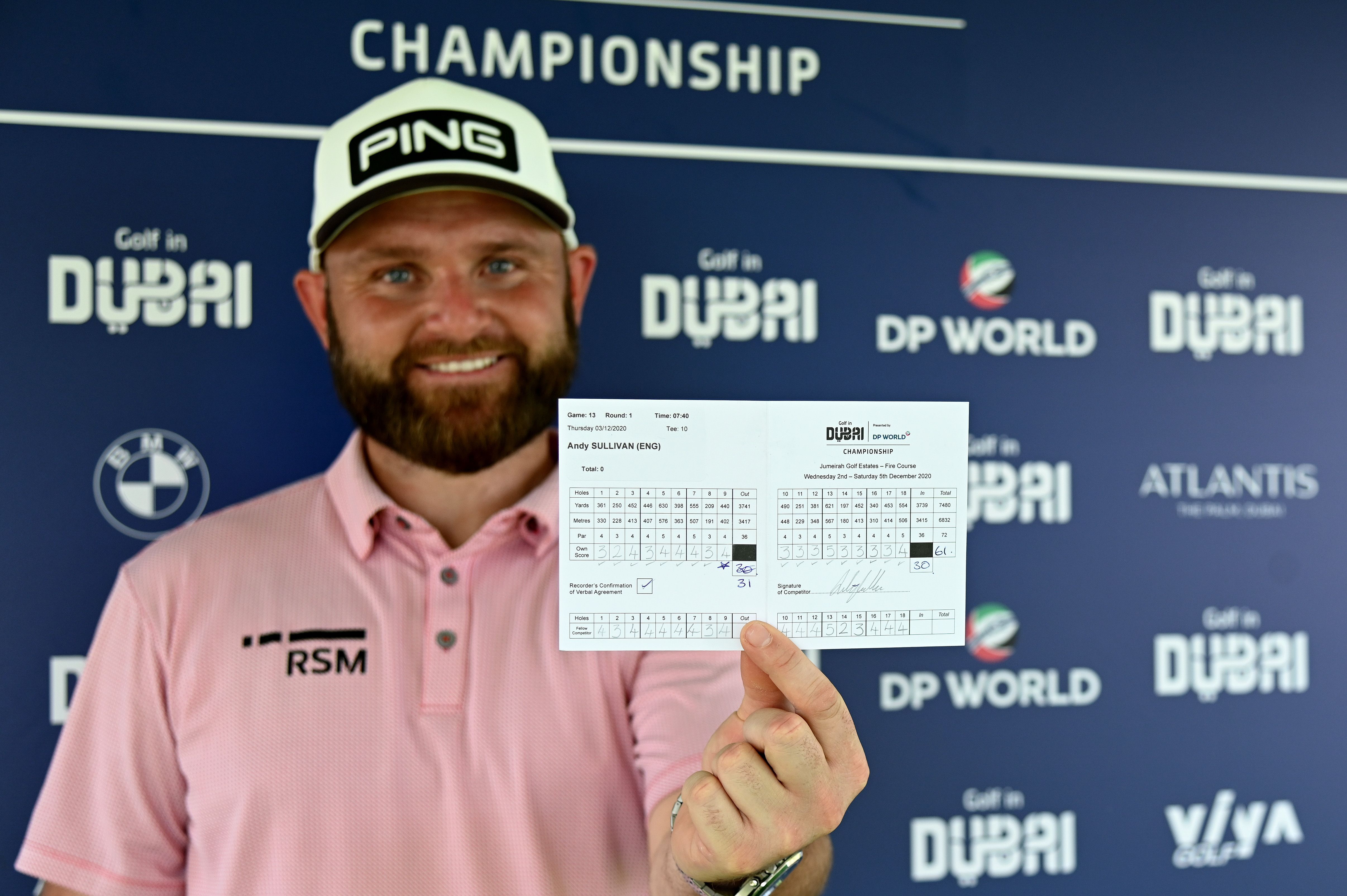 andy sullivan celebrating with his course record scorecard