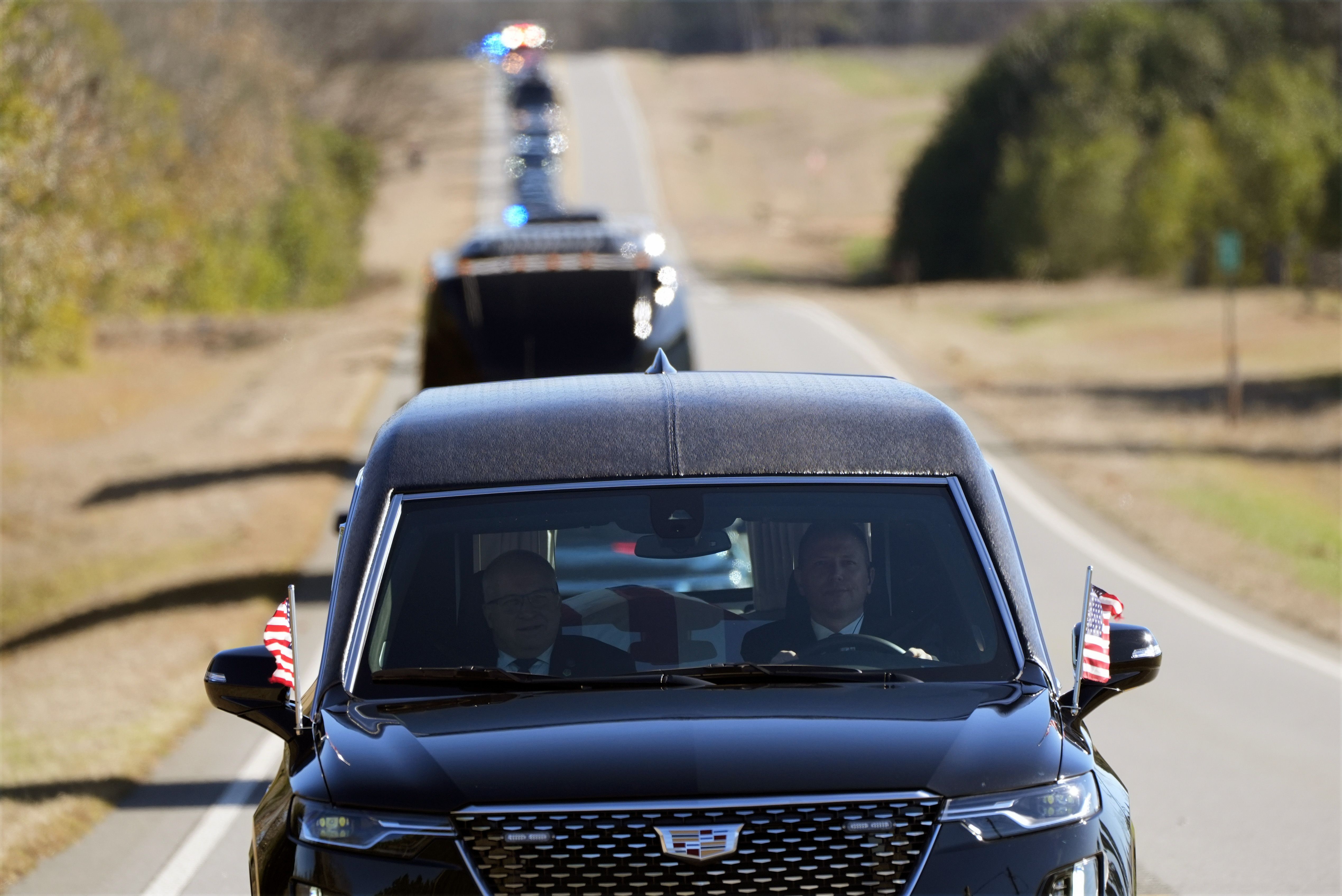 : The hearse containing the casket of former President Jimmy Carter moves towards Plains on January 4, 2025 in Plains, Georgia. Six days of funeral observances will take place for former President Jimmy Carter after he died on Dec. 29 at the age of 100. President Carter was the longest-living U.S. P