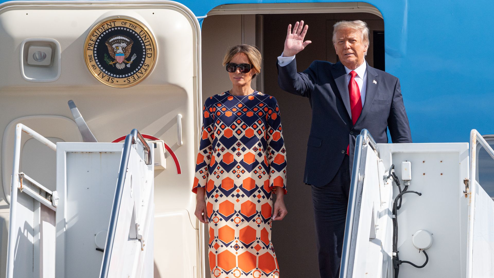 Outgoing U.S. President Donald Trump and First Lady Melania Trump exit Air Force One at the Palm Beach International Airport