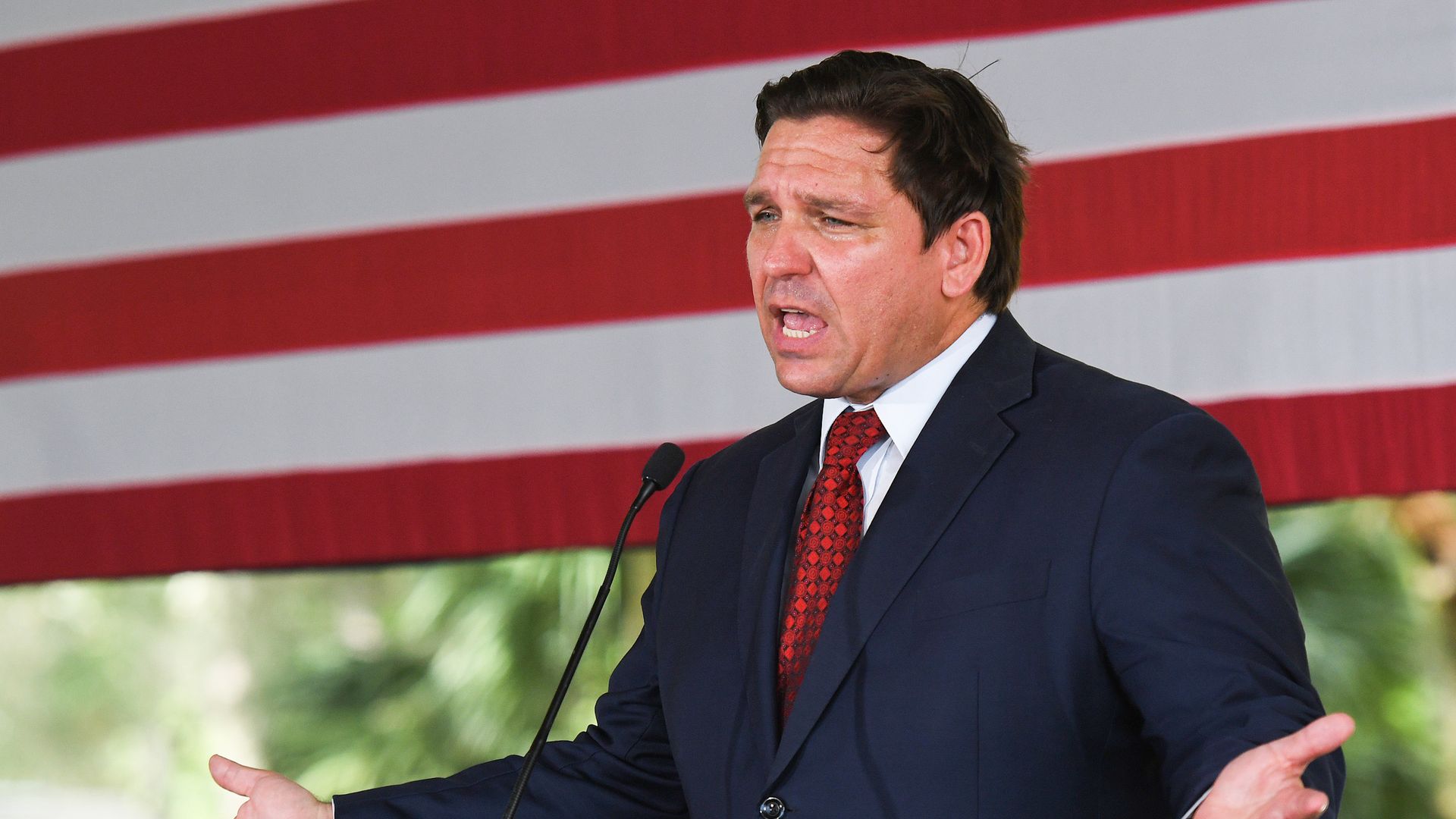Photo of Ron DeSantis speaking with his hands spread
