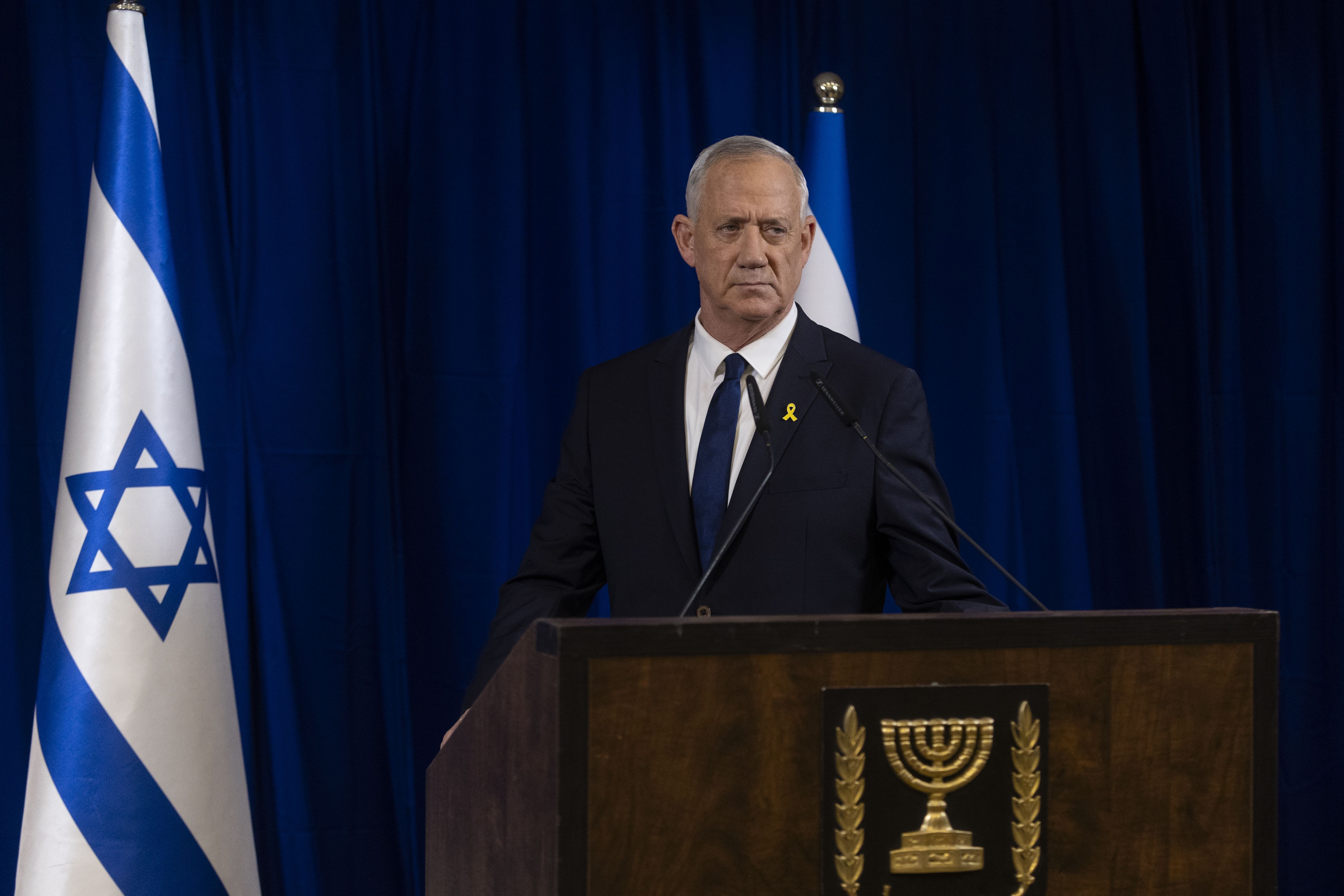 Benny Gantz announces his resignation from Israel's war cabinet during a press conference in Tel Aviv yesterday.
