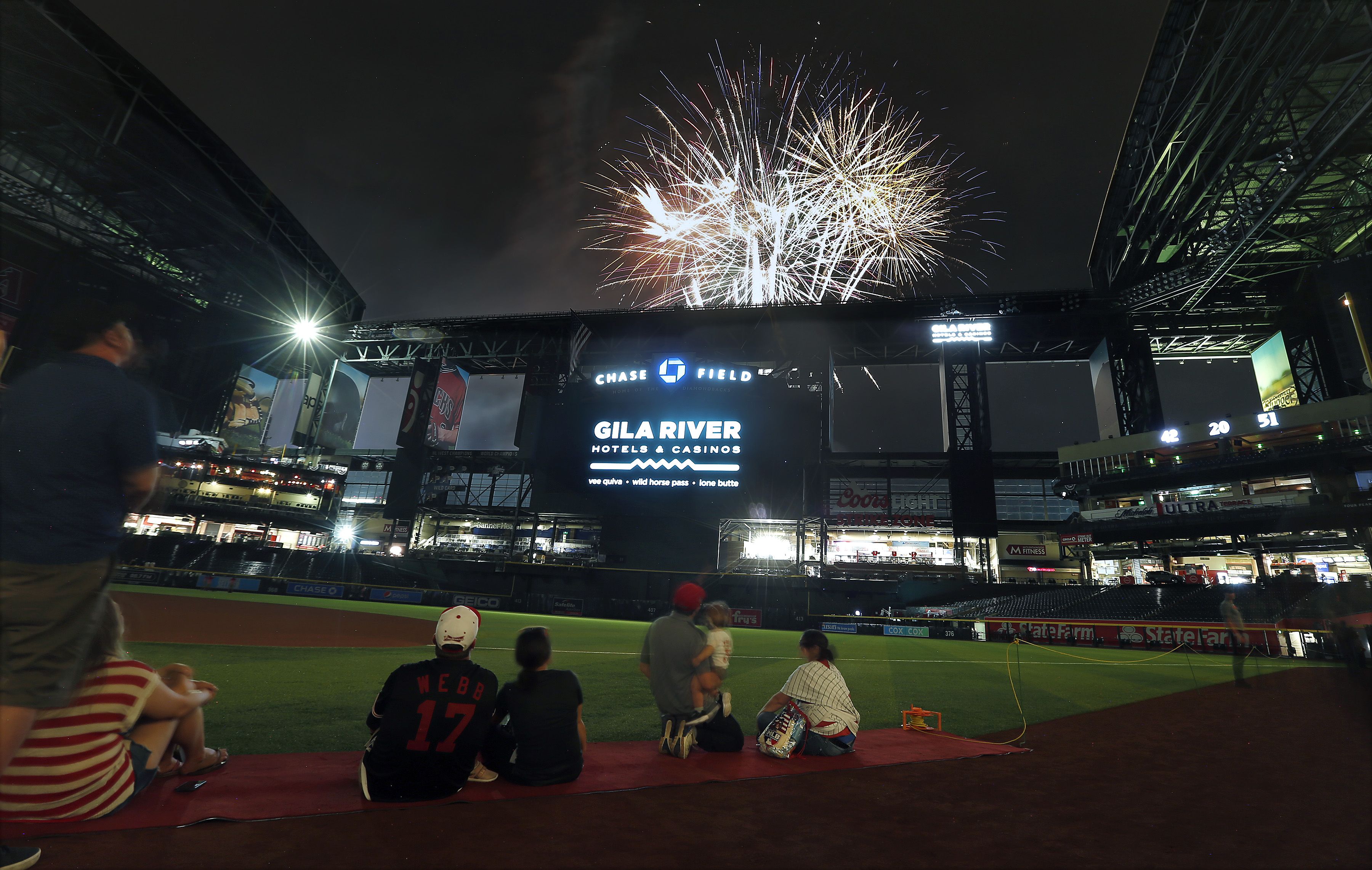 Fans enjoy a July 4 fireworks display in Phoenix, Arizona. 