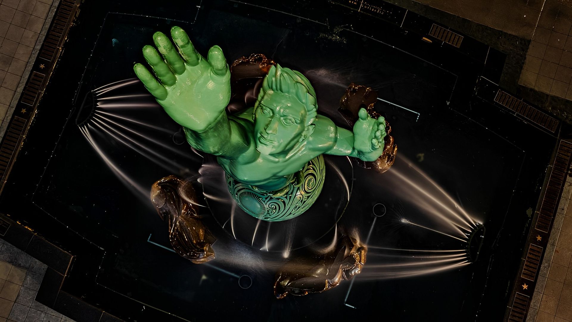 Photo of a fountain statue from above. 