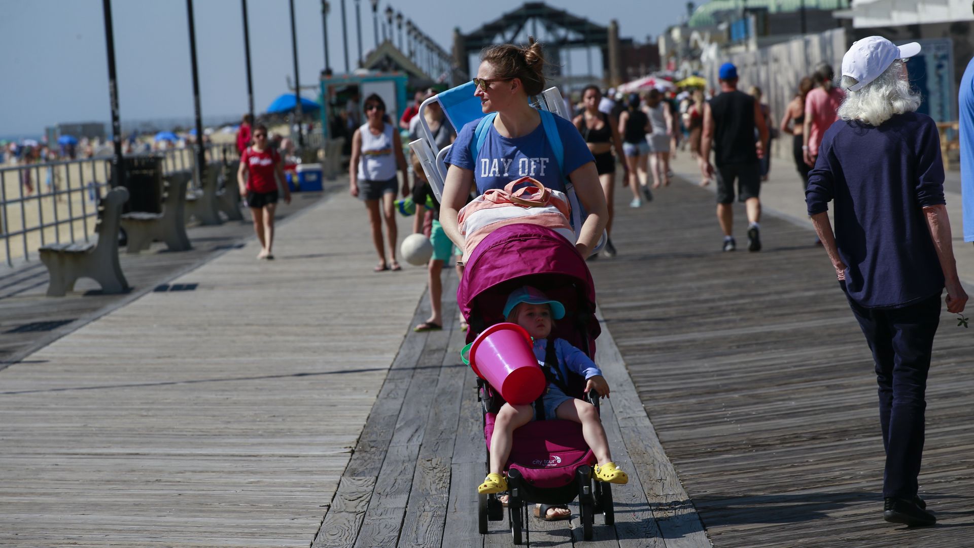 Visitors to a New Jersey boardwalk on Memorial Day, 2019. Photo: Kena Betancur/Getty Images
