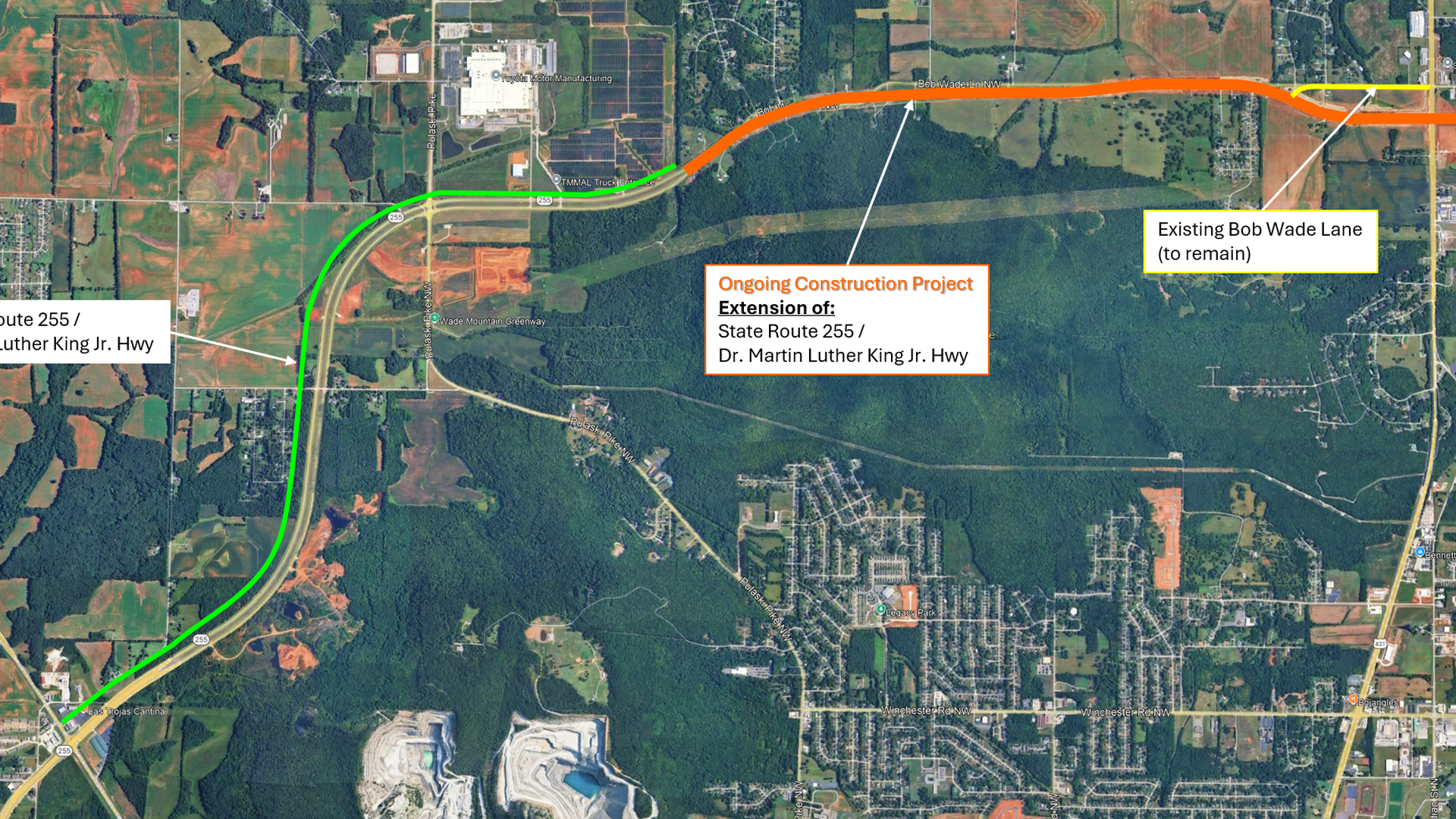 Aerial map of a highway with colored lines marking roads: green/yellow for State Route 255/Dr. Martin Luther King Jr. Hwy, orange for an ongoing extension project, and yellow for the existing Bob Wade Lane.