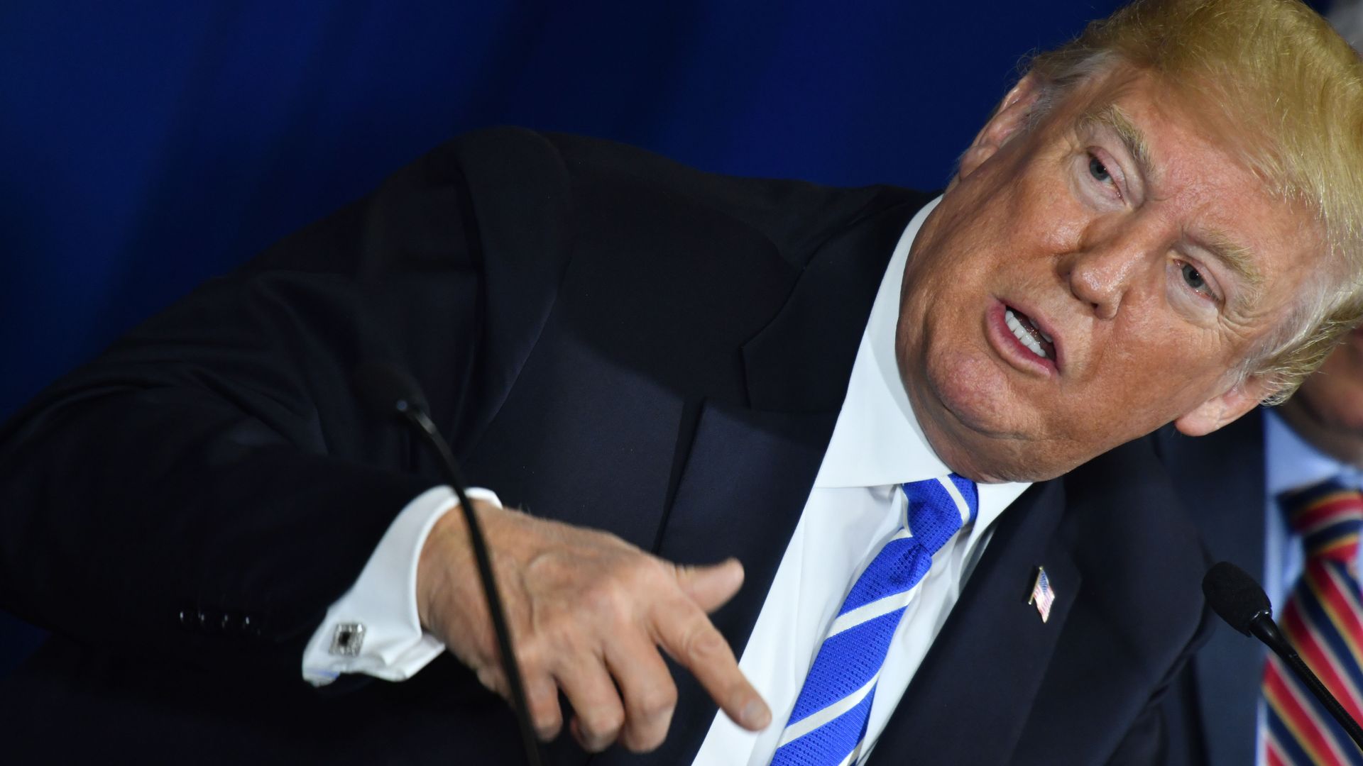 Donald Trump speaking to a crowd