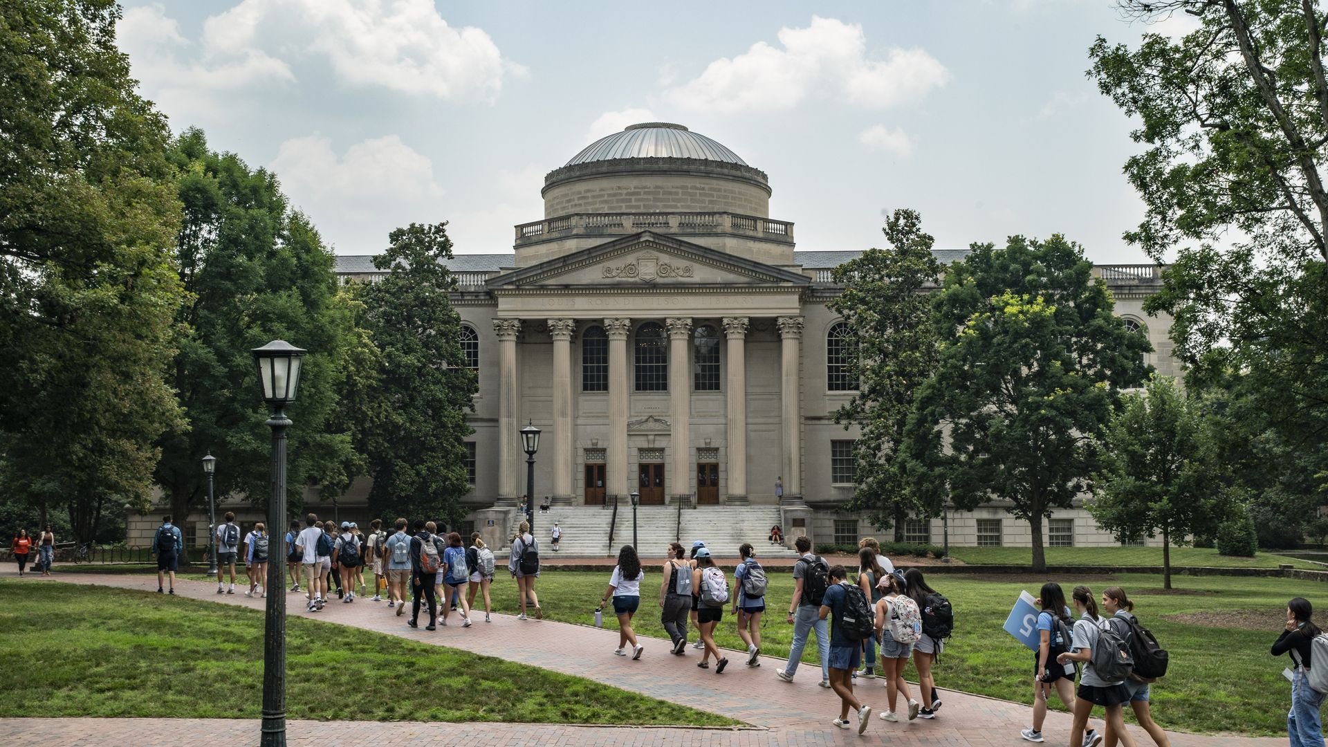 CHAPEL HILL, NORTH CAROLINA - JUNE 29: People walk on the campus of the University of North Carolina Chapel Hill on June 29, 2023 in Chapel Hill, North Carolina. The U.S. Supreme Court ruled that race-conscious admission policies used by Harvard and the University of North Carolina violate the Const