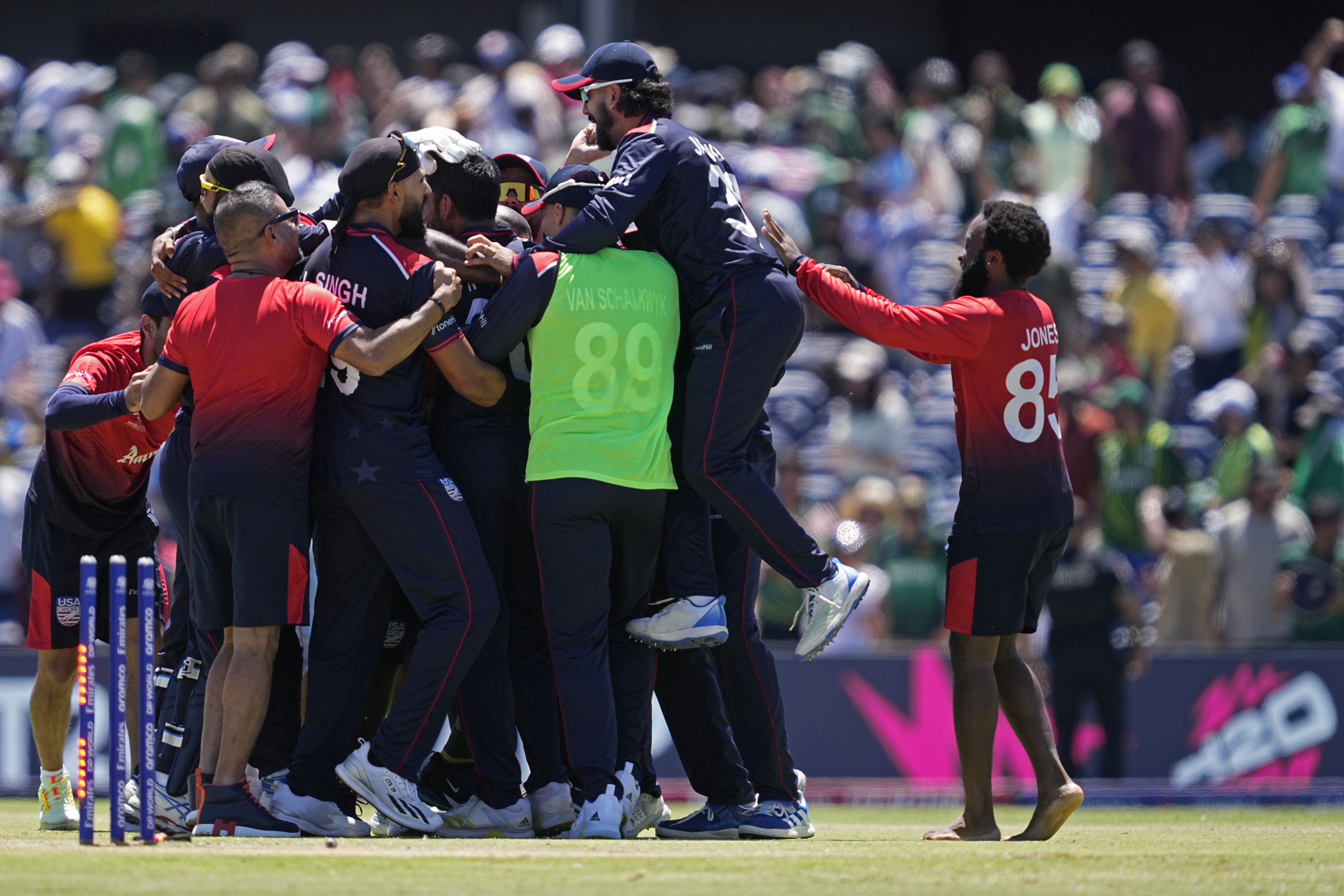 The U.S. national cricket team celebrates after beating Pakistan yesterday.