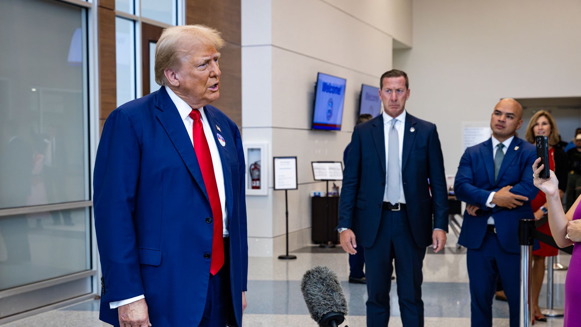 Trump speaks to reporters in Florida.