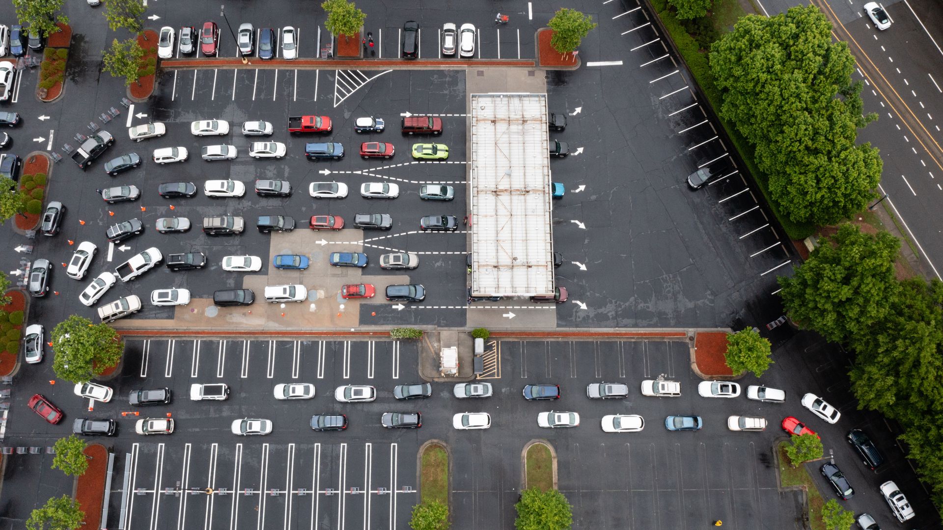 Photo of a parking lot filled with backed up cars