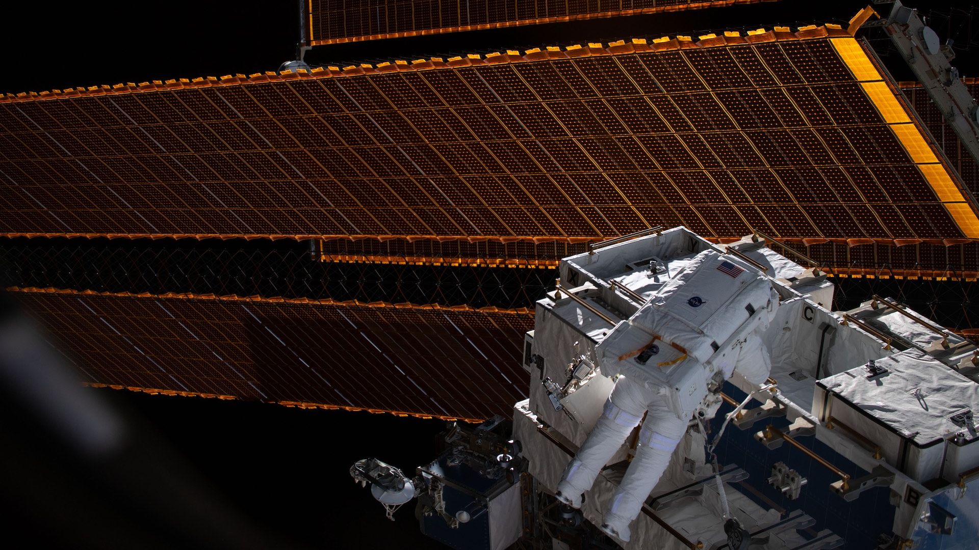 An astronaut working on the outside of the International Space Station.