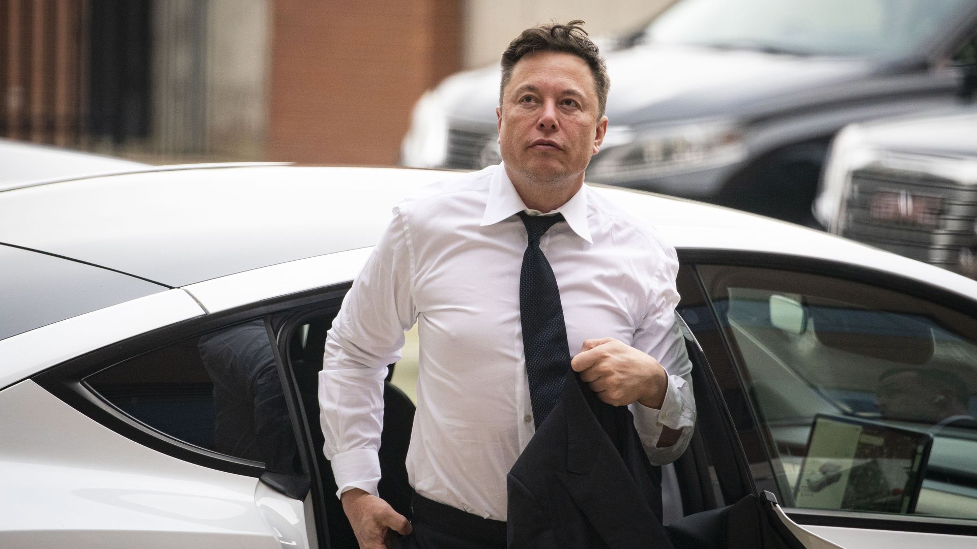 Elon Musk, chief executive officer of Tesla Inc., arrives at court during the SolarCity trial in Wilmington, Delaware, U.S., on Tuesday, July 13