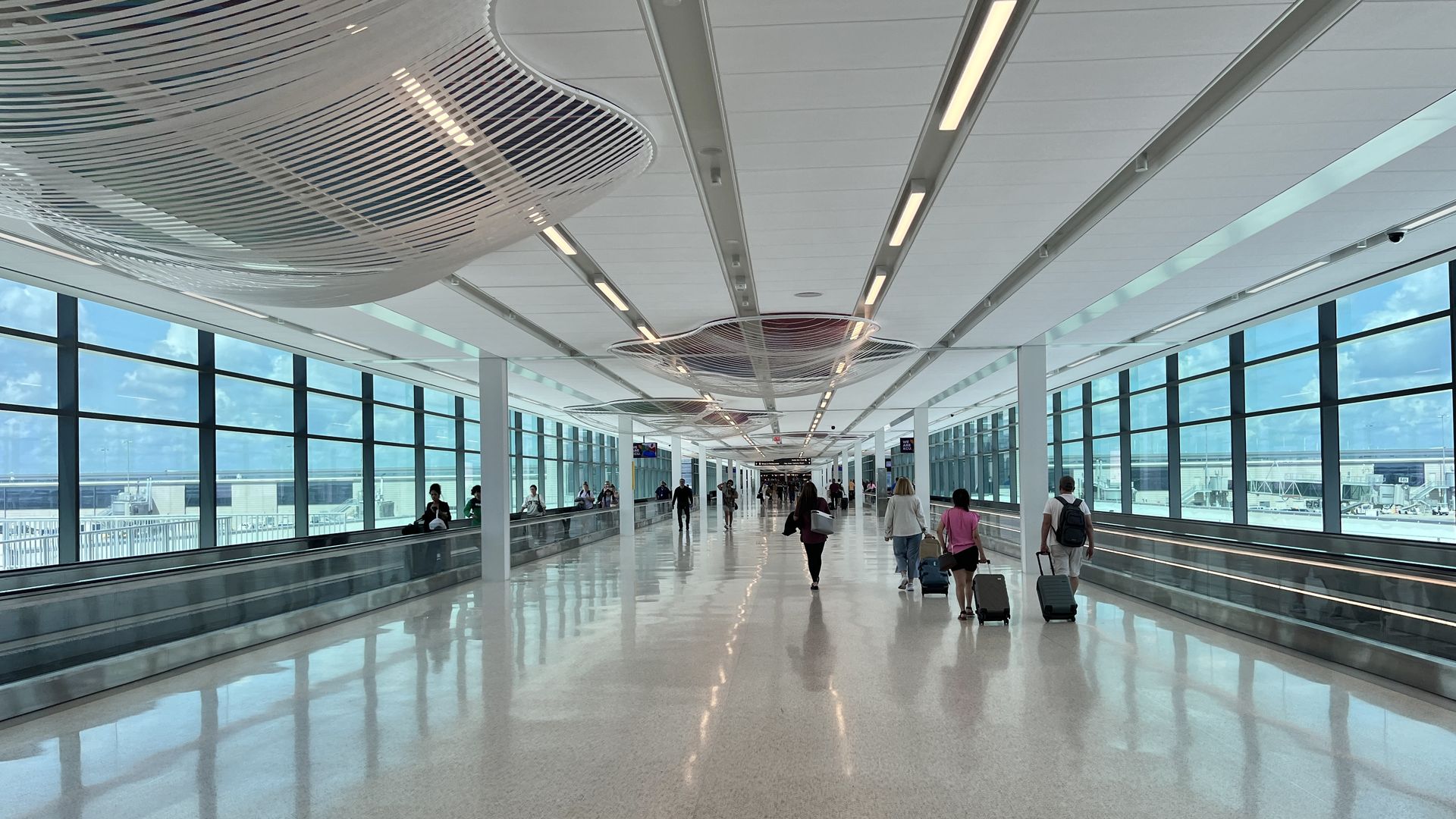 Photo shows the walkway with moving sidewalks in between terminal A and B at KCI.