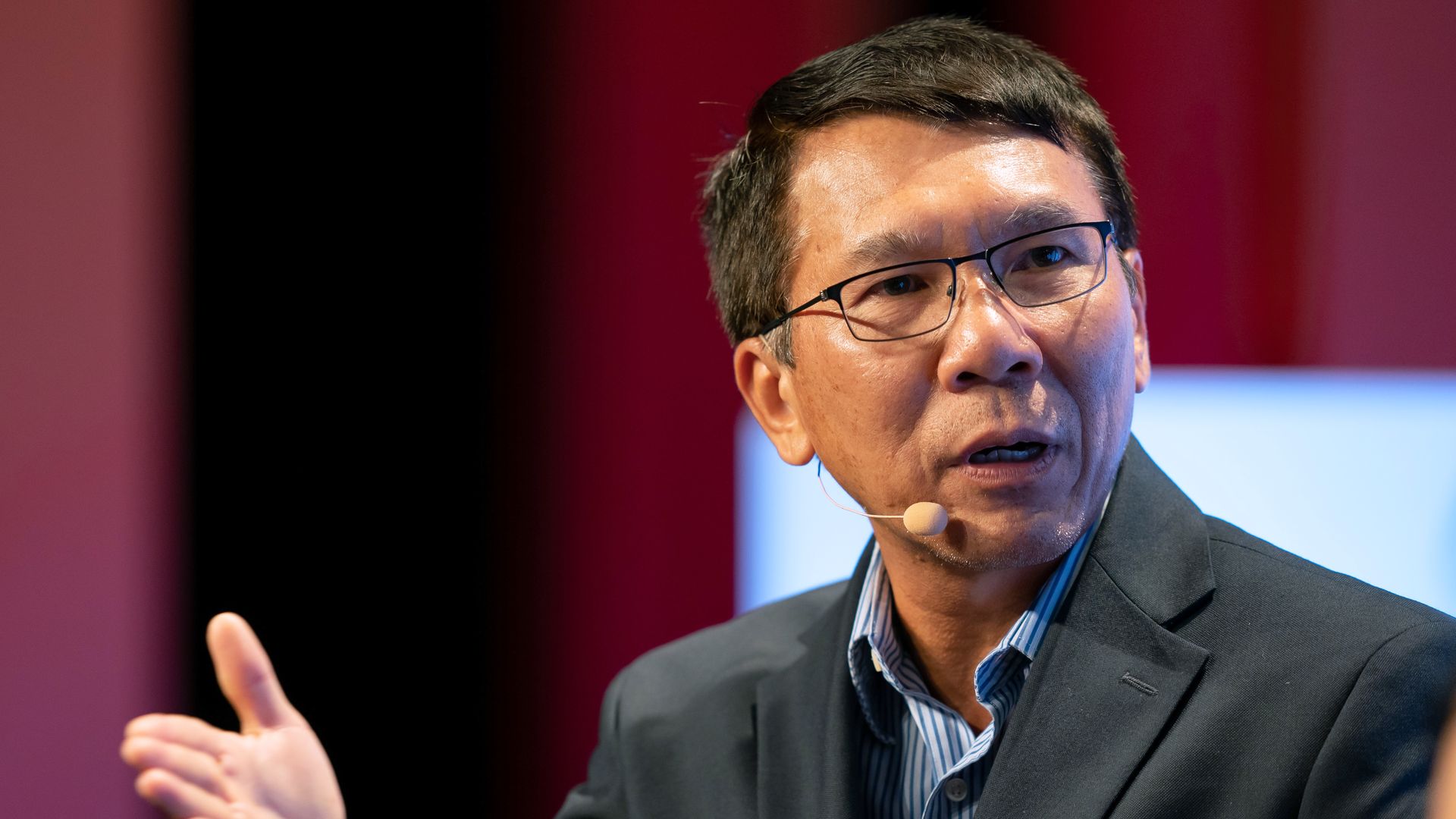 Thuan Pham speaking at a conference