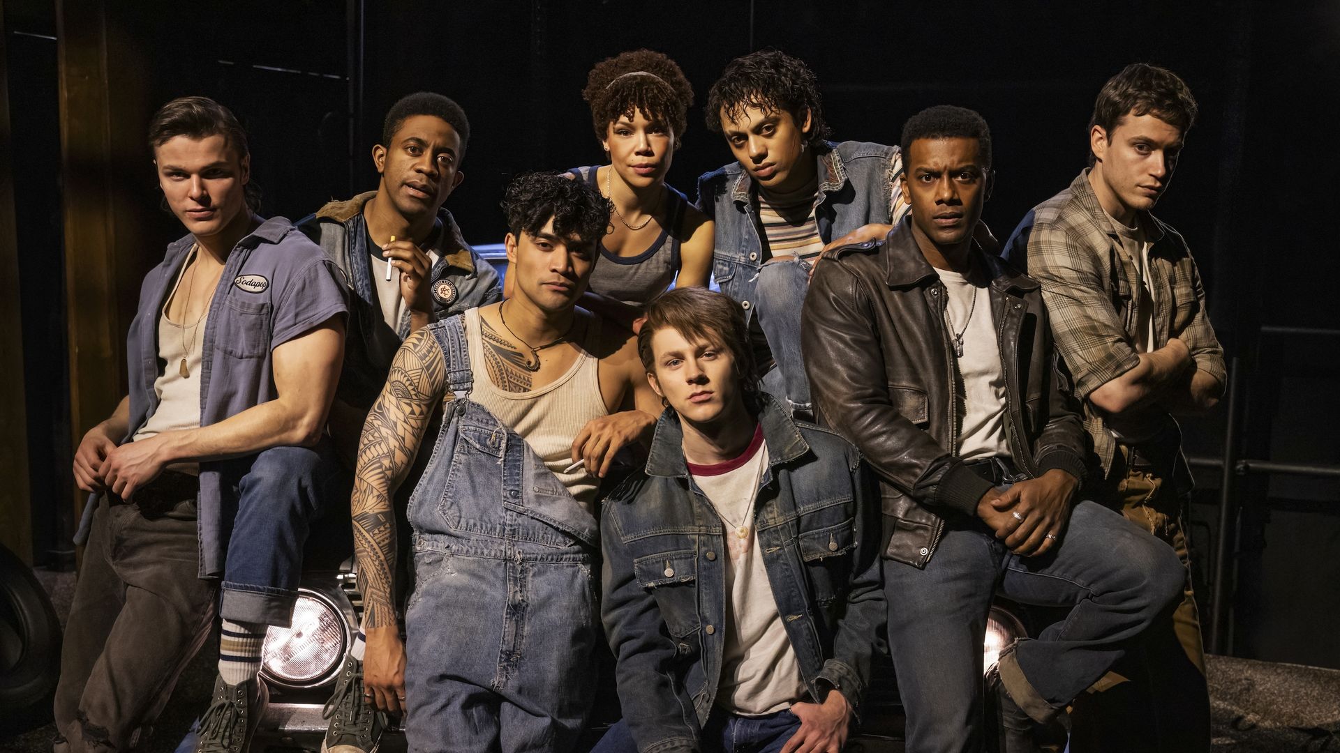 The cast of "The Outsiders" musical poses for a photo. 
