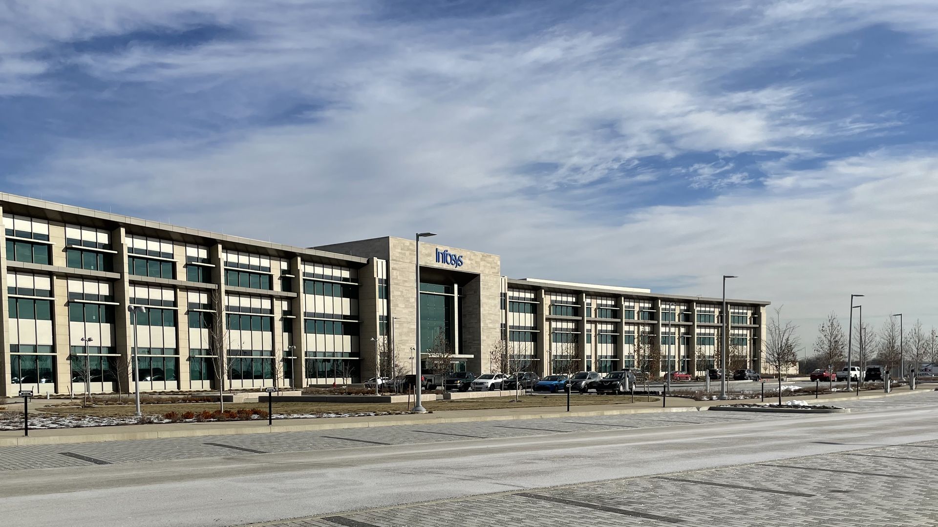 A mostly empty parking lot in front of the Infosys building near Indianapolis International Airport.