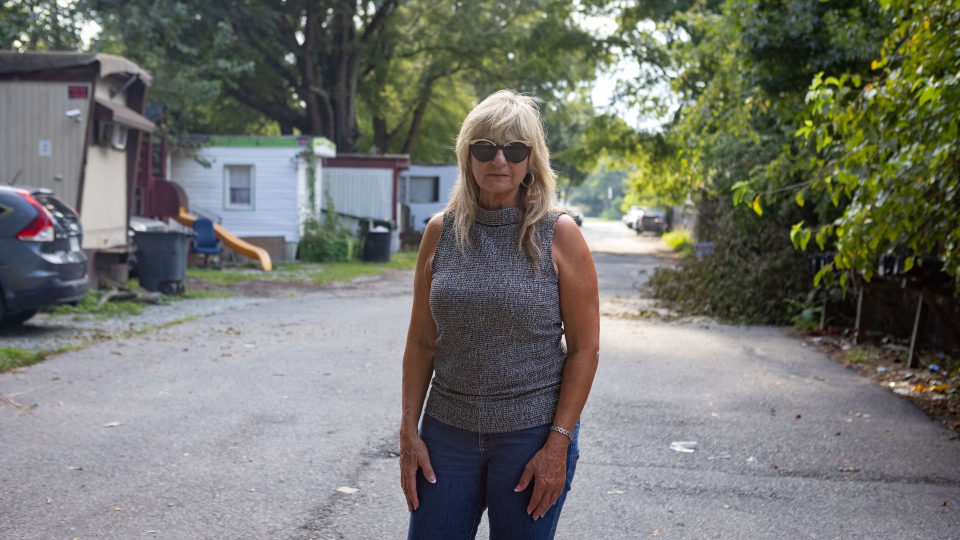 An image of Richmond councilwoman Reva Trammell standing on a street in her district.